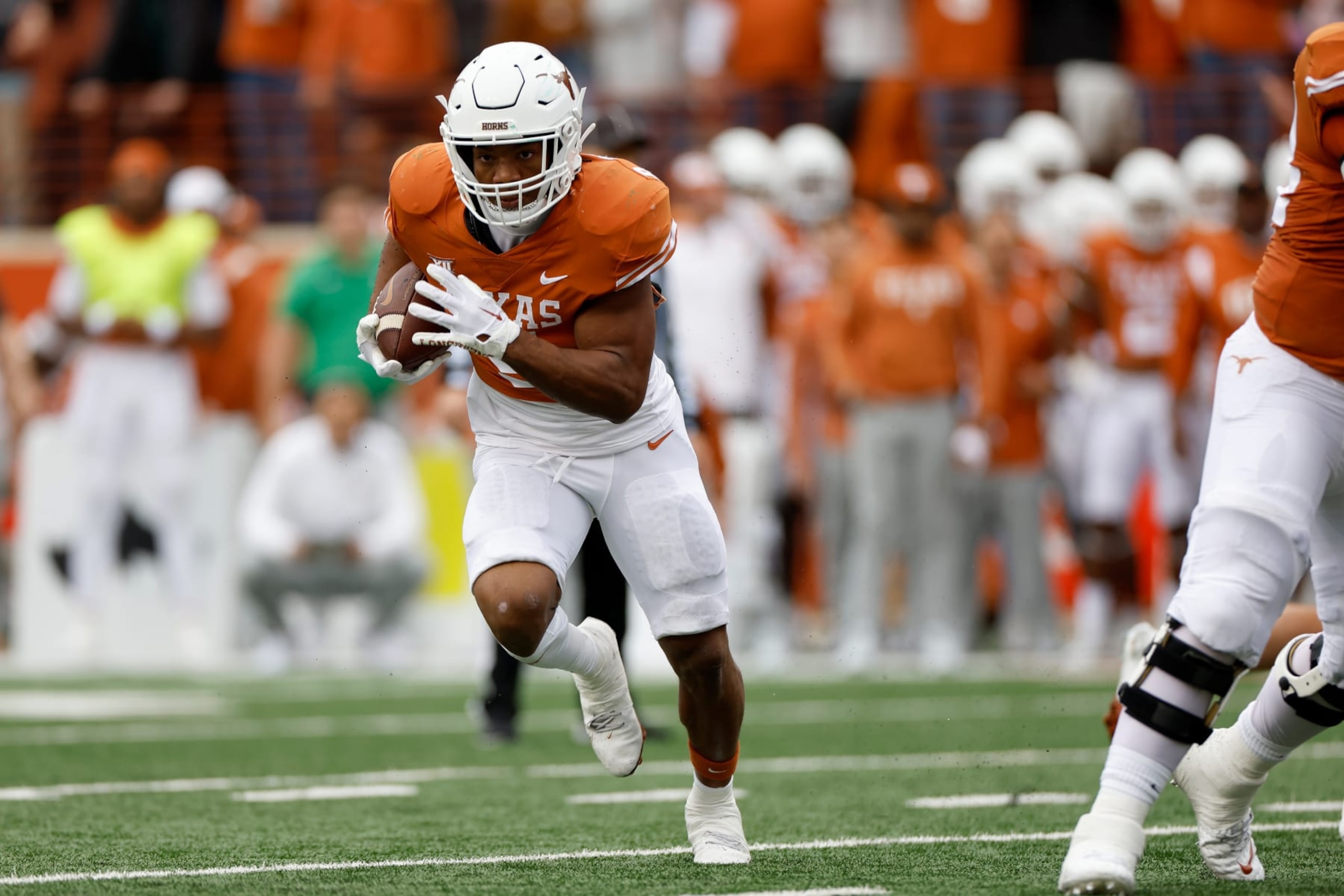 AUSTIN, TEXAS - NOVEMBER 25: Bijan Robinson #5 of the Texas Longhorns rushes for a touchdown in the first half against the Baylor Bears at Darrell K Royal-Texas Memorial Stadium on November 25, 2022 in Austin, Texas. (Photo by Tim Warner/Getty Images)