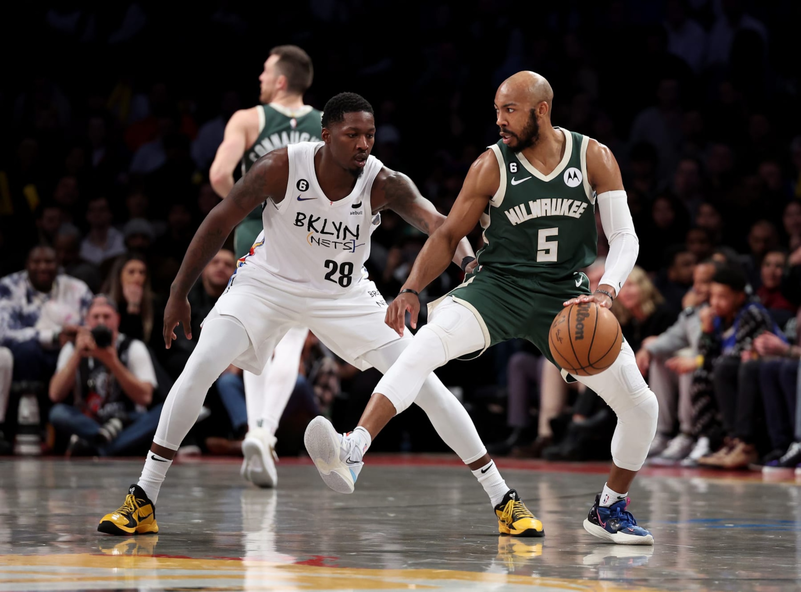 NEW YORK, NEW YORK - FEBRUARY 28: Jevon Carter #5 of the Milwaukee Bucks in action against Dorian Finney-Smith #28 of the Brooklyn Nets during their game at Barclays Center on February 28, 2023 in New York City. User expressly acknowledges and agrees that, by downloading and or using this photograph, User is consenting to the terms and conditions of the Getty Images License Agreement. (Photo by Al Bello/Getty Images) NEW YORK, NEW YORK - FEBRUARY 28: Jevon Carter #5 of the Milwaukee Bucks in action against Dorian Finney-Smith #28 of the Brooklyn Nets during their game at Barclays Center on February 28, 2023 in New York City. User expressly acknowledges and agrees that, by downloading and or using this photograph, User is consenting to the terms and conditions of the Getty Images License Agreement. (Photo by Al Bello/Getty Images)