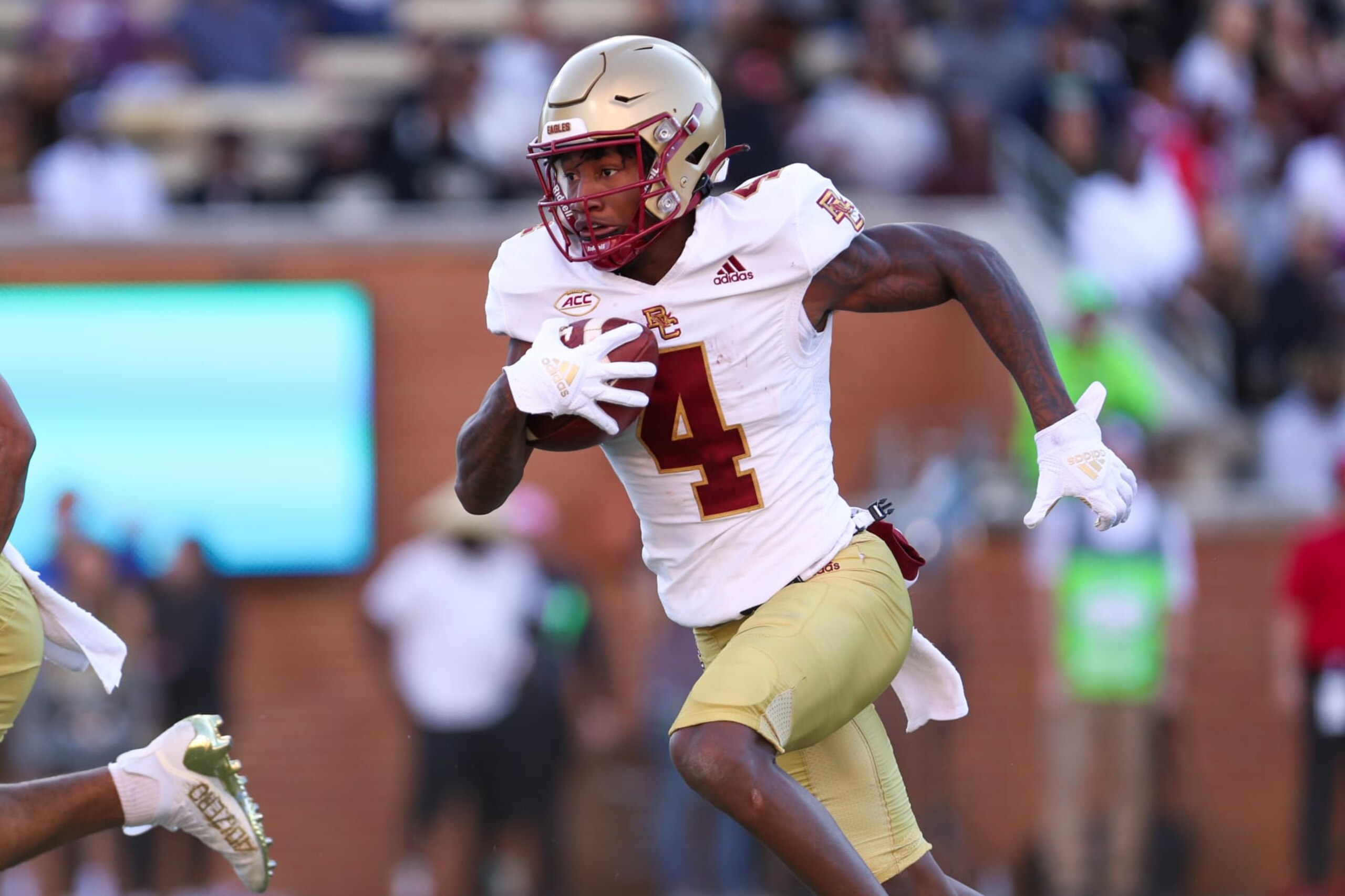 WINSTON-SALEM, NC - OCTOBER 22: Zay Flowers (4) of the Boston College Eagles runs the ball during a football game between the Wake Forest Demon Deacons and the Boston College Eagles October 22, 2022, at Truist Field in Winston-Salem, NC. (Photo by David Jensen/Icon Sportswire via Getty Images)