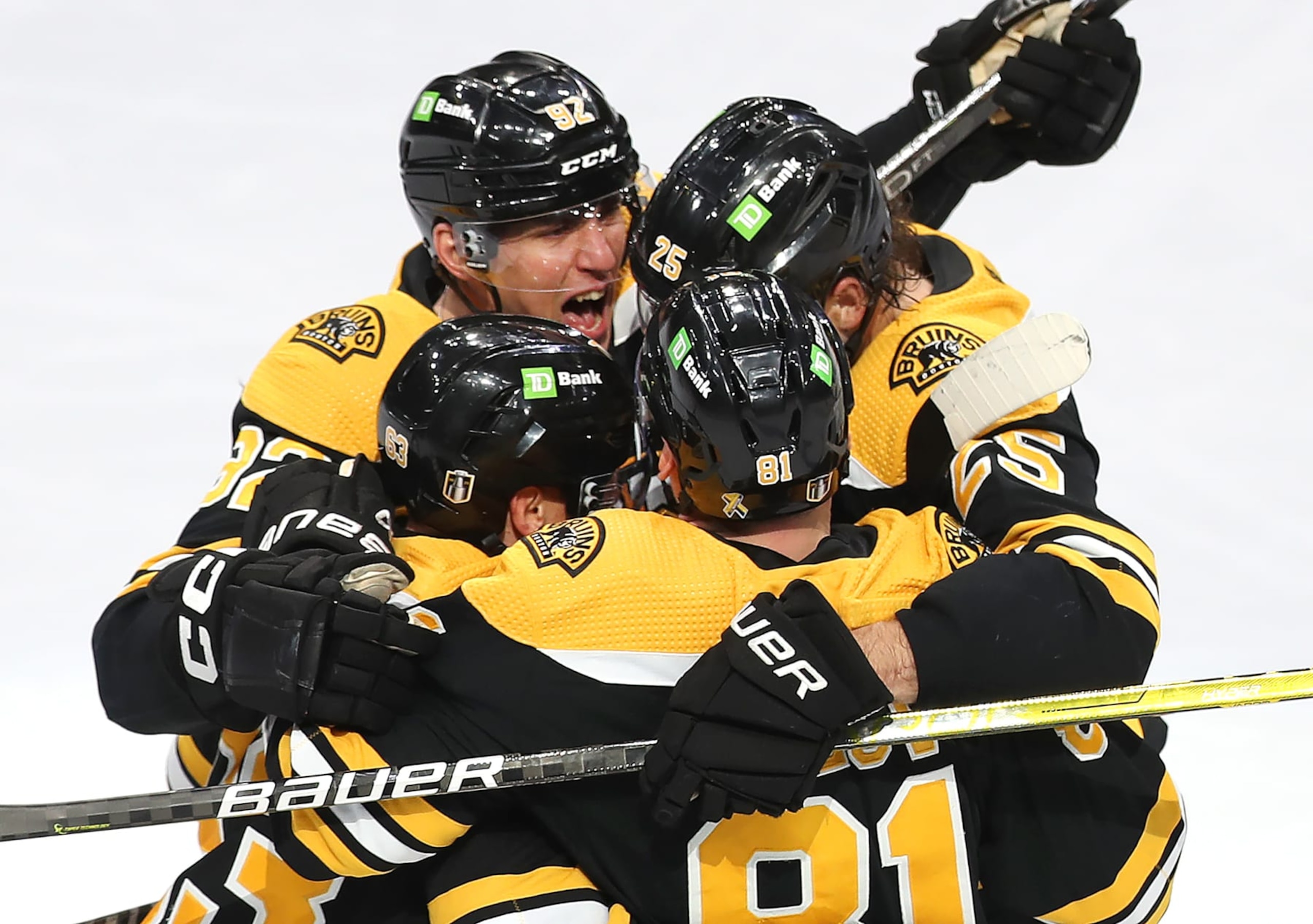 Boston, MA - April 19: Boston Bruins players huddle after a second period goal. The Bruins lost to the Florida Panthers, 6-3, in Game 2 of their Eastern Conference First Round Series. (Photo by John Tlumacki/The Boston Globe via Getty Images)
