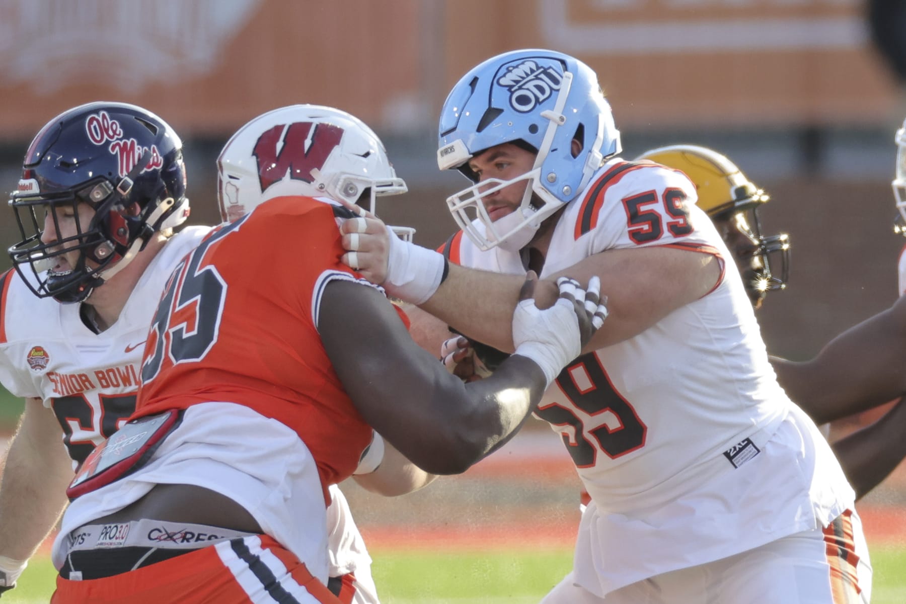MOBILE, AL - FEBRUARY 04: American offensive lineman Nick Saldiveri of Old Dominion (59) blocks National defensive lineman Keeanu Benton of Washington (95) during the Reeses Senior Bowl game. (Photo by Bobby McDuffie/Icon Sportswire via Getty Images)