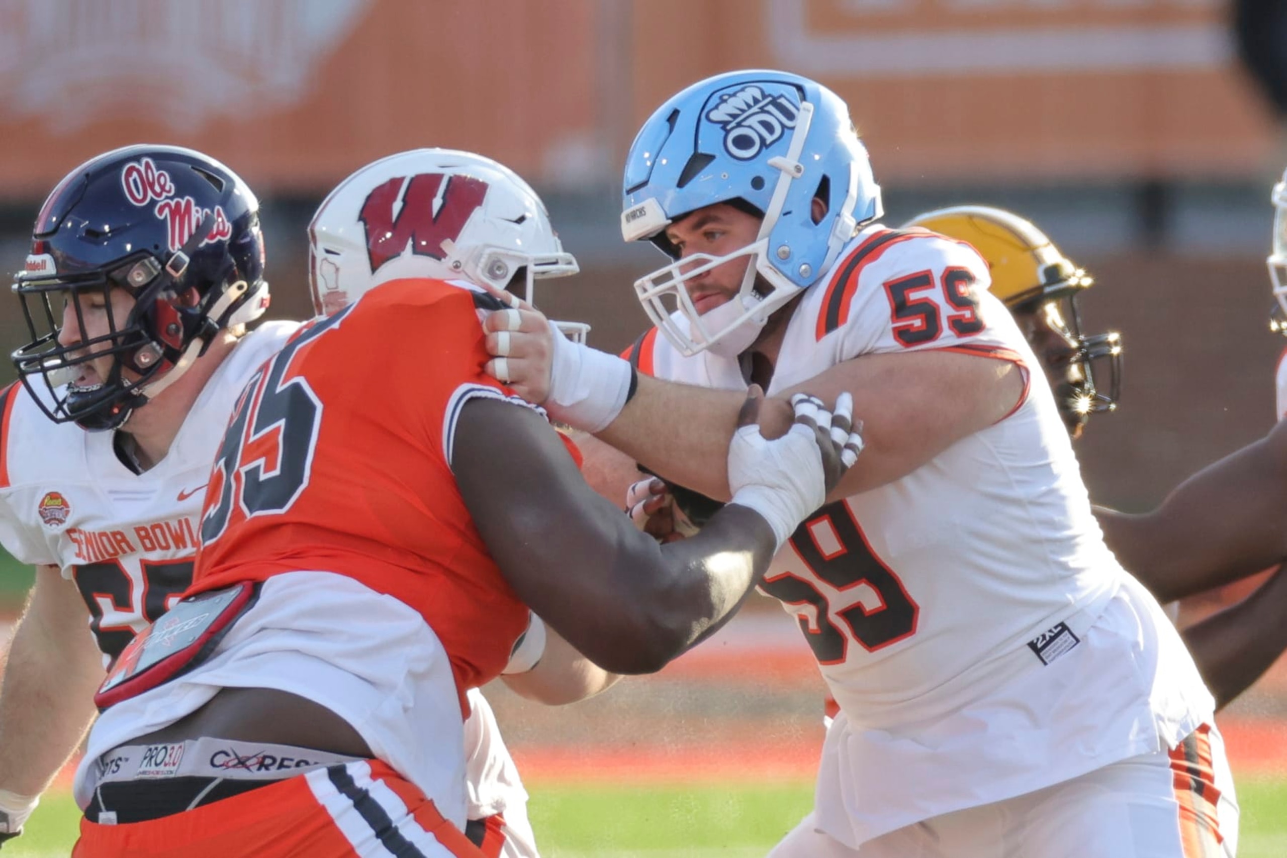 MOBILE, AL - FEBRUARY 04: American offensive lineman Nick Saldiveri of Old Dominion (59) blocks National defensive lineman Keeanu Benton of Washington (95) during the Reeses Senior Bowl game. (Photo by Bobby McDuffie/Icon Sportswire via Getty Images)