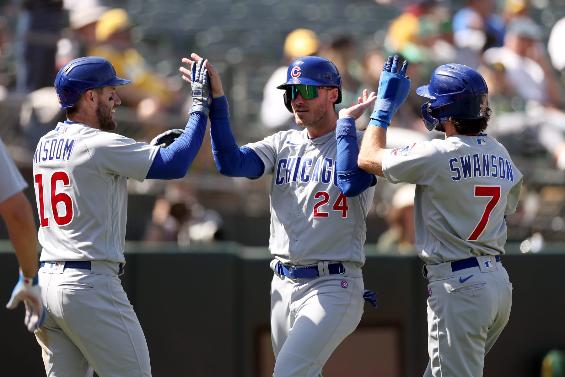 Patrick Wisom (L), Cody Bellinger (C) and Dansby Swanson (R)