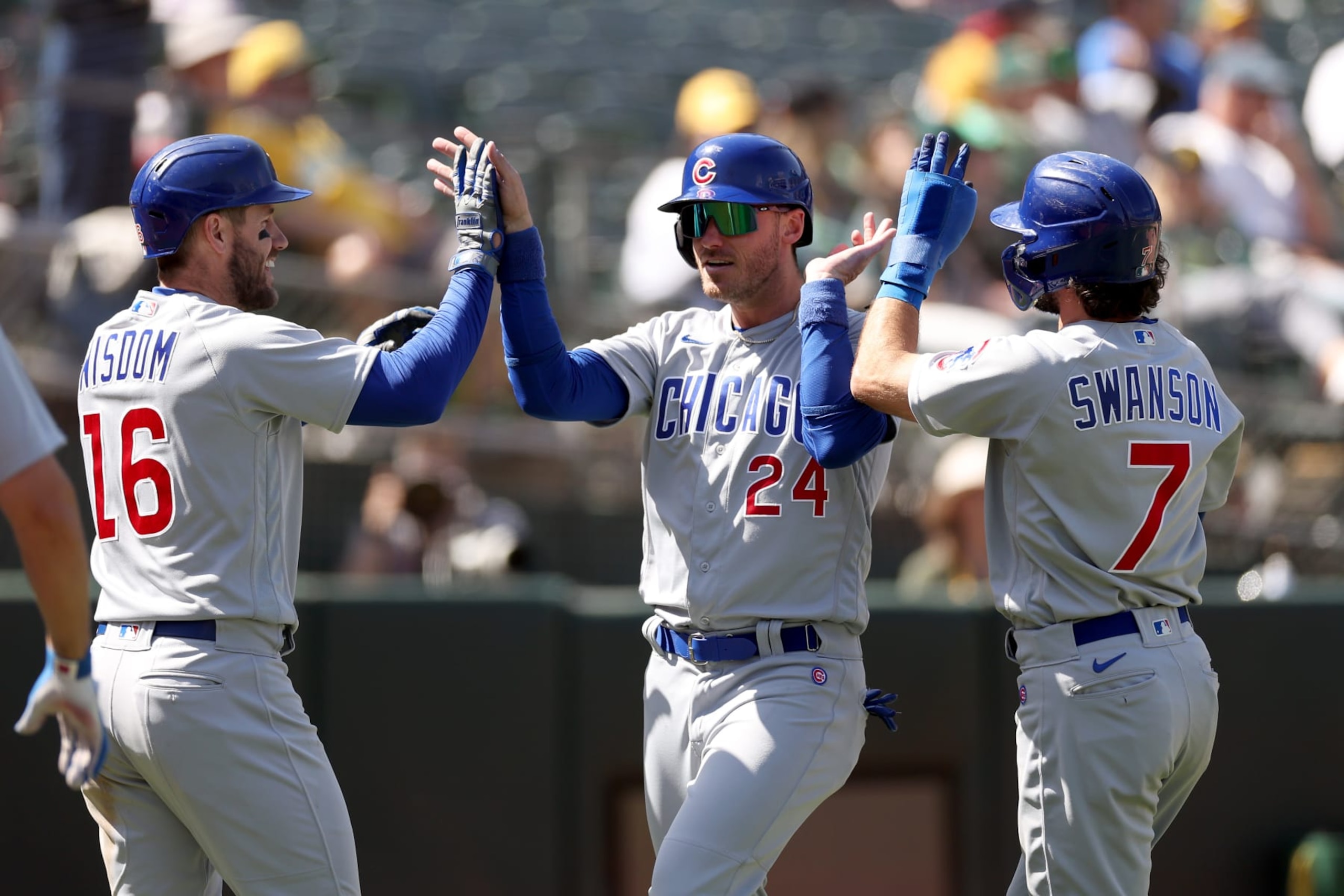 Patrick Wisom (L), Cody Bellinger (C) and Dansby Swanson (R)