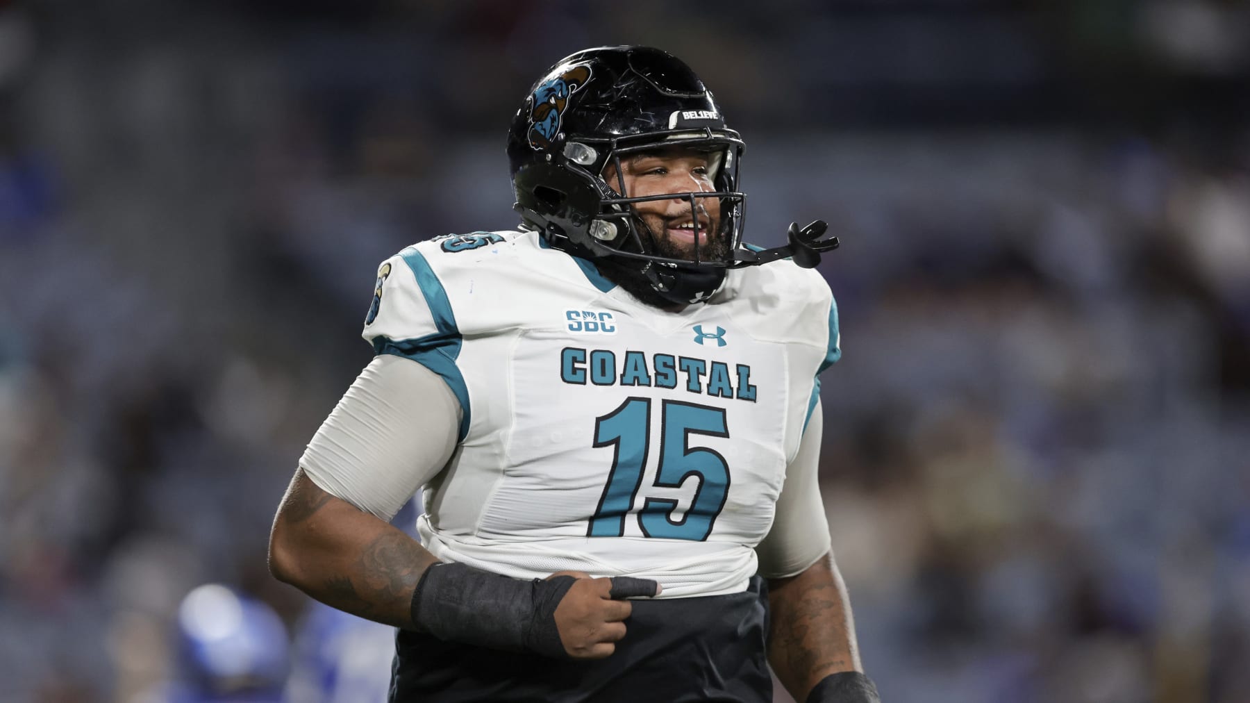 Coastal Carolina nose tackle Jerrod Clark (15) runs during the first half of an NCAA football game against Georgia State on Thursday, Sept. 22, 2022, in Atlanta. (AP Photo/Stew Milne)