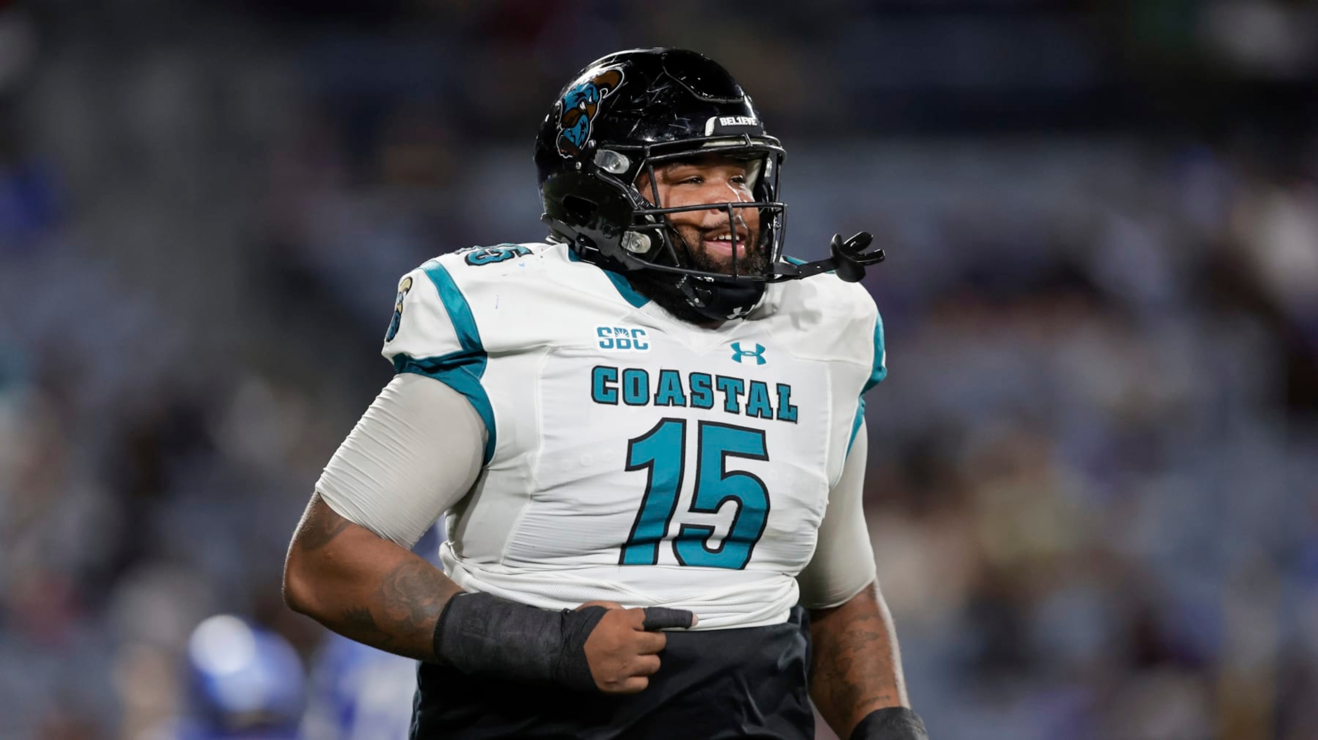 Coastal Carolina nose tackle Jerrod Clark (15) runs during the first half of an NCAA football game against Georgia State on Thursday, Sept. 22, 2022, in Atlanta. (AP Photo/Stew Milne)