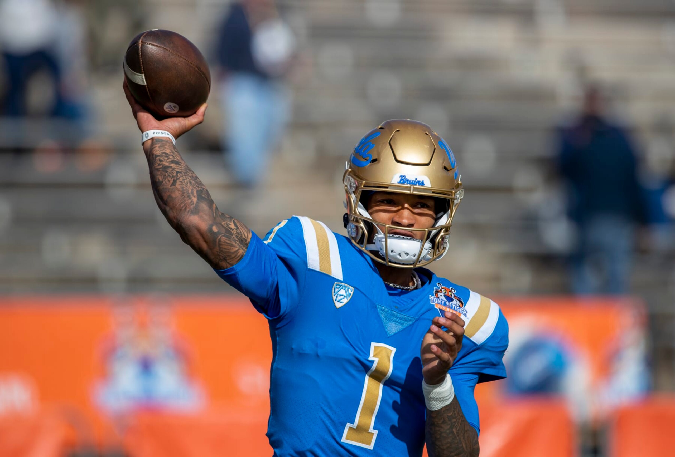 UCLA quarterback Dorian Thompson-Robinson throws during warm ups before the start of the Sun Bowl NCAA college football game against Pittsburgh, Friday, Dec. 30, 2022 in El Paso, Texas. (AP Photo/Andres Leighton) UCLA quarterback Dorian Thompson-Robinson throws during warm ups before the start of the Sun Bowl NCAA college football game against Pittsburgh, Friday, Dec. 30, 2022 in El Paso, Texas. (AP Photo/Andres Leighton)