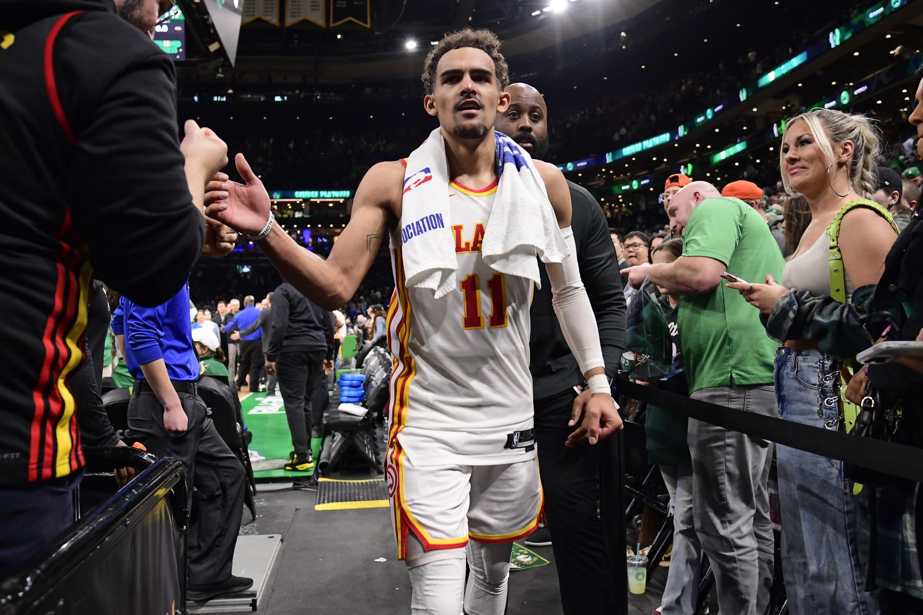 BOSTON, MA - APRIL 25: Trae Young #11 of the Atlanta Hawks high fives the fans after the game against the Boston Celtics during Round One Game Five of the 2023 NBA Playoffs on April 25, 2023 at the TD Garden in Boston, Massachusetts. NOTE TO USER: User expressly acknowledges and agrees that, by downloading and or using this photograph, User is consenting to the terms and conditions of the Getty Images License Agreement. Mandatory Copyright Notice: Copyright 2023 NBAE  (Photo by Brian Babineau/NBAE via Getty Images)