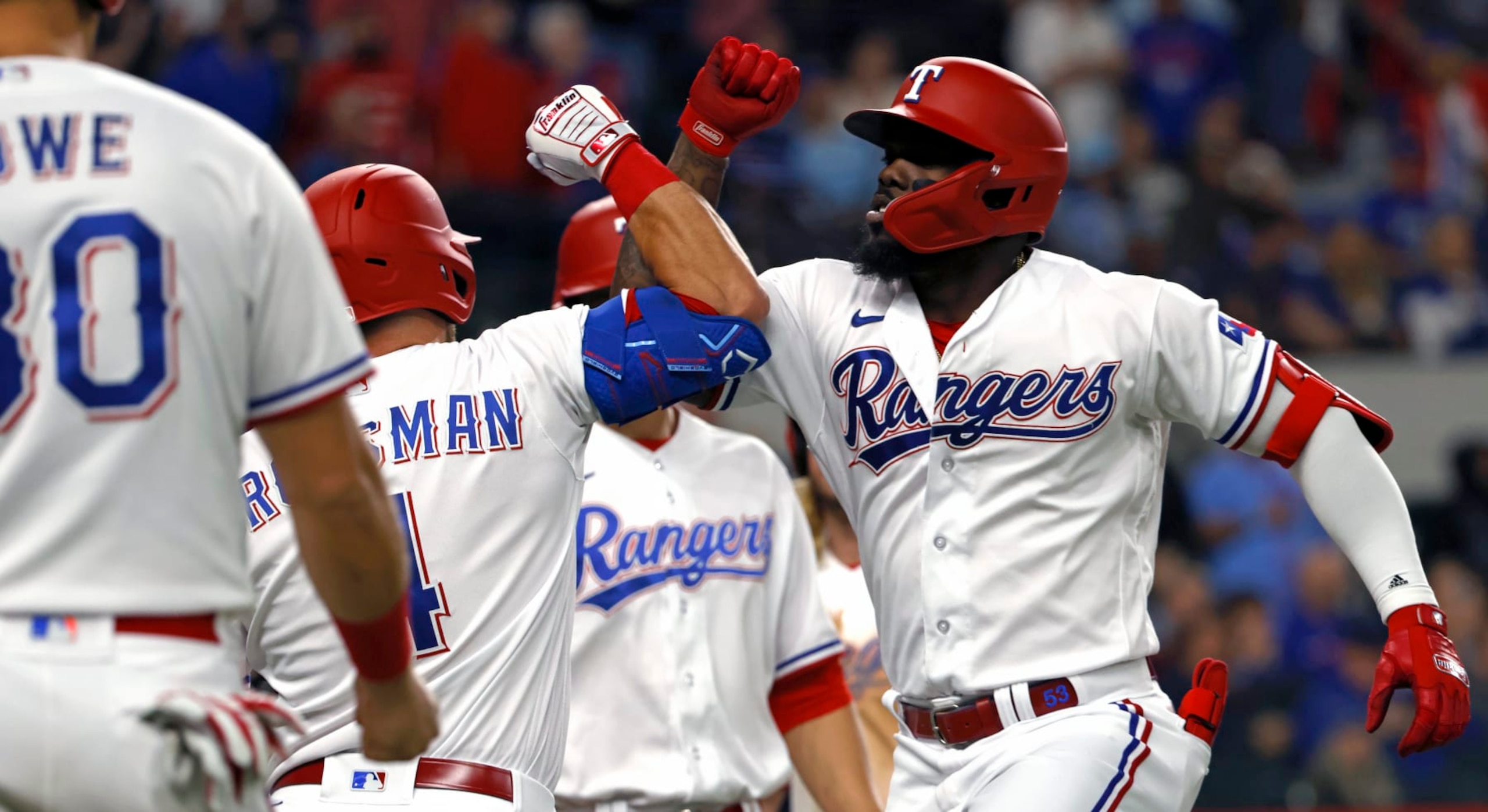 ARLINGTON, TX - APRIL 10: Adolis Garcia #53 of the Texas Rangers celebrates with teammates after hitting a grand slam against the Kansas City Royals during the sixth inning at Globe Life Field on April 10, 2023 in Arlington, Texas. (Photo by Ron Jenkins/Getty Images) ARLINGTON, TX - APRIL 10: Adolis Garcia #53 of the Texas Rangers celebrates with teammates after hitting a grand slam against the Kansas City Royals during the sixth inning at Globe Life Field on April 10, 2023 in Arlington, Texas. (Photo by Ron Jenkins/Getty Images)