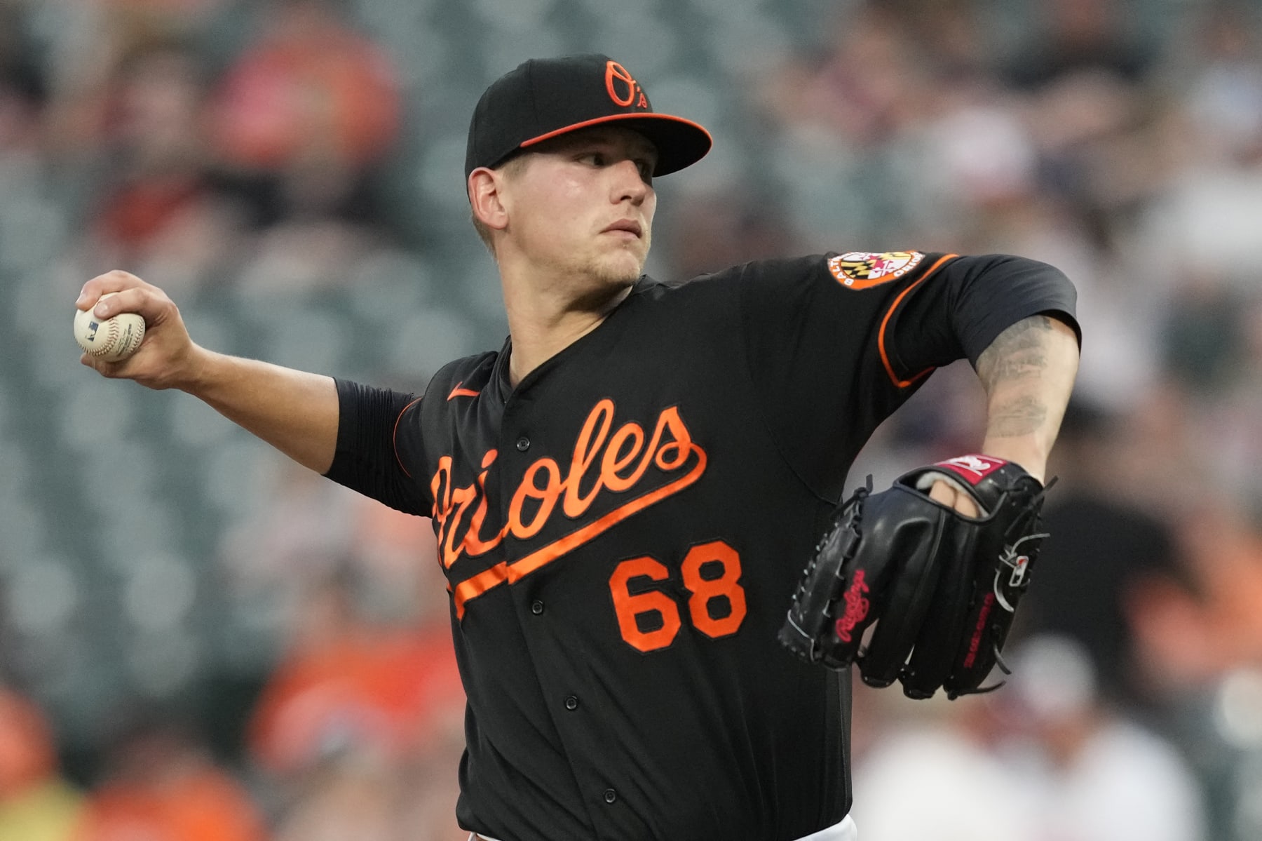 BALTIMORE, MARYLAND - APRIL 21:  Tyler Wells #68 of the Baltimore Orioles pitches in the first inning during a baseball game against  the Detroit Tigers at Oriole Park at Camden Yards on April 21, 2023 in Baltimore, Maryland.  (Photo by Mitchell Layton/Getty Images)