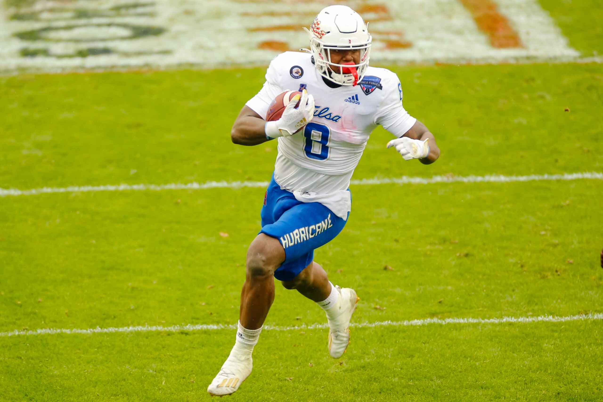FORT WORTH, TX - DECEMBER 31: Tulsa Golden Hurricane running back Deneric Prince (8) looks for running room during the Armed Forces Bowl game between the Tulsa Golden Hurricane and the Mississippi State Bulldogs on December 31, 2020 at Amon G. Carter Stadium in Fort Worth, Texas. (Photo by Matthew Pearce/Icon Sportswire via Getty Images)