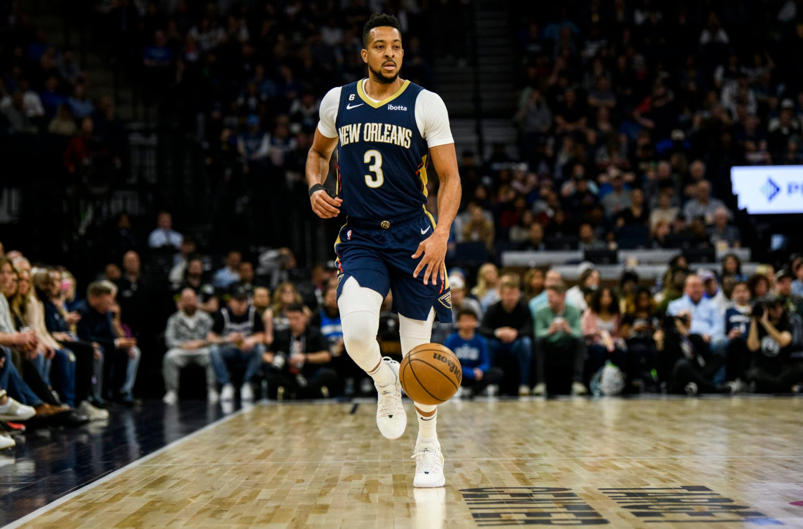 MINNEAPOLIS, MN - APRIL 09: CJ McCollum #3 of the New Orleans Pelicans dribbles the ball in the first quarter of the game against the Minnesota Timberwolves at Target Center on April 9, 2023 in Minneapolis, Minnesota. (Photo by Stephen Maturen/Getty Images) NOTE TO USER: User expressly acknowledges and agrees that, by downloading and or using this photograph, User is consenting to the terms and conditions of the Getty Images License Agreement.