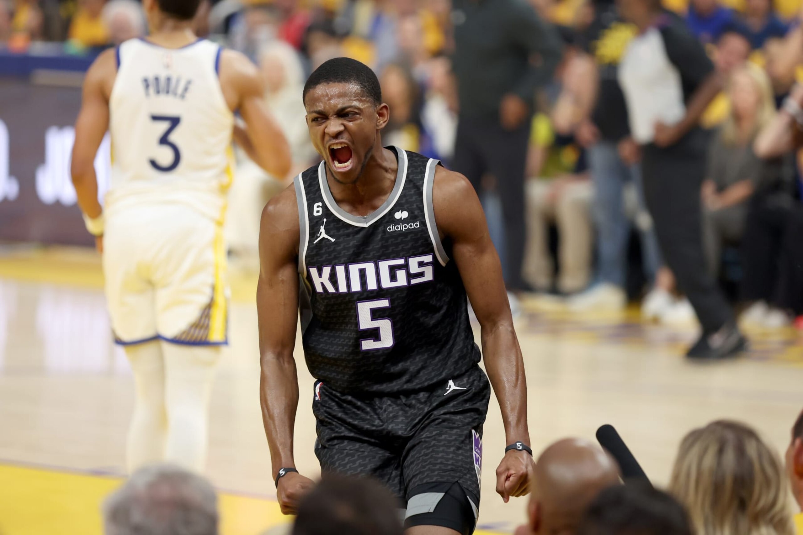SAN FRANCISCO, CALIFORNIA - APRIL 23: De'Aaron Fox #5 of the Sacramento Kings reacts after he dunked the ball against the Golden State Warriors during Game Four of the Western Conference First Round Playoffs at Chase Center on April 23, 2023 in San Francisco, California. NOTE TO USER: User expressly acknowledges and agrees that, by downloading and or using this photograph, User is consenting to the terms and conditions of the Getty Images License Agreement. (Photo by Ezra Shaw/Getty Images)