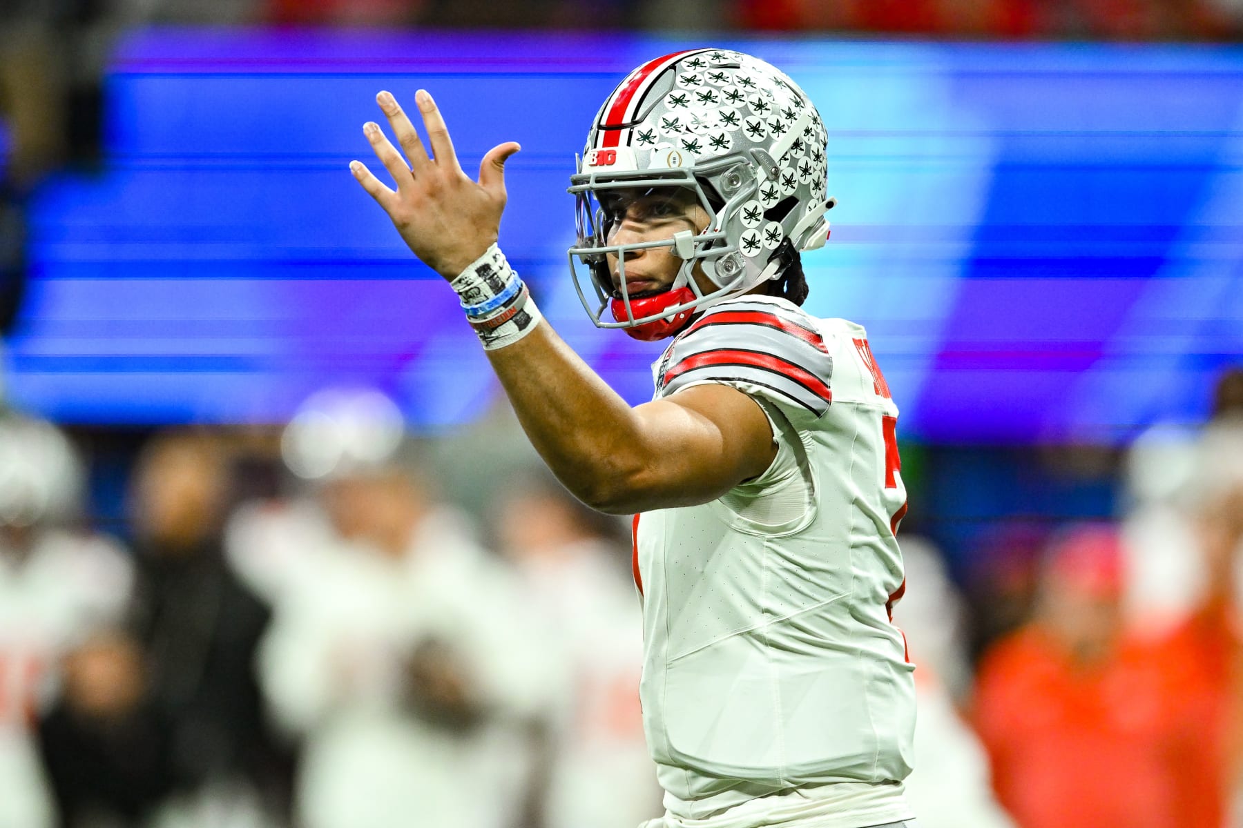 ATLANTA, GA  DECEMBER 31:  Ohio State quarterback C.J. Stroud (7) gestures during the Chick-fil-A Peach Bowl college football playoff game between the Ohio State Buckeyes and the Georgia Bulldogs on December 31st, 2022 at Mercedes-Benz Stadium in Atlanta, GA.  (Photo by Rich von Biberstein/Icon Sportswire via Getty Images)