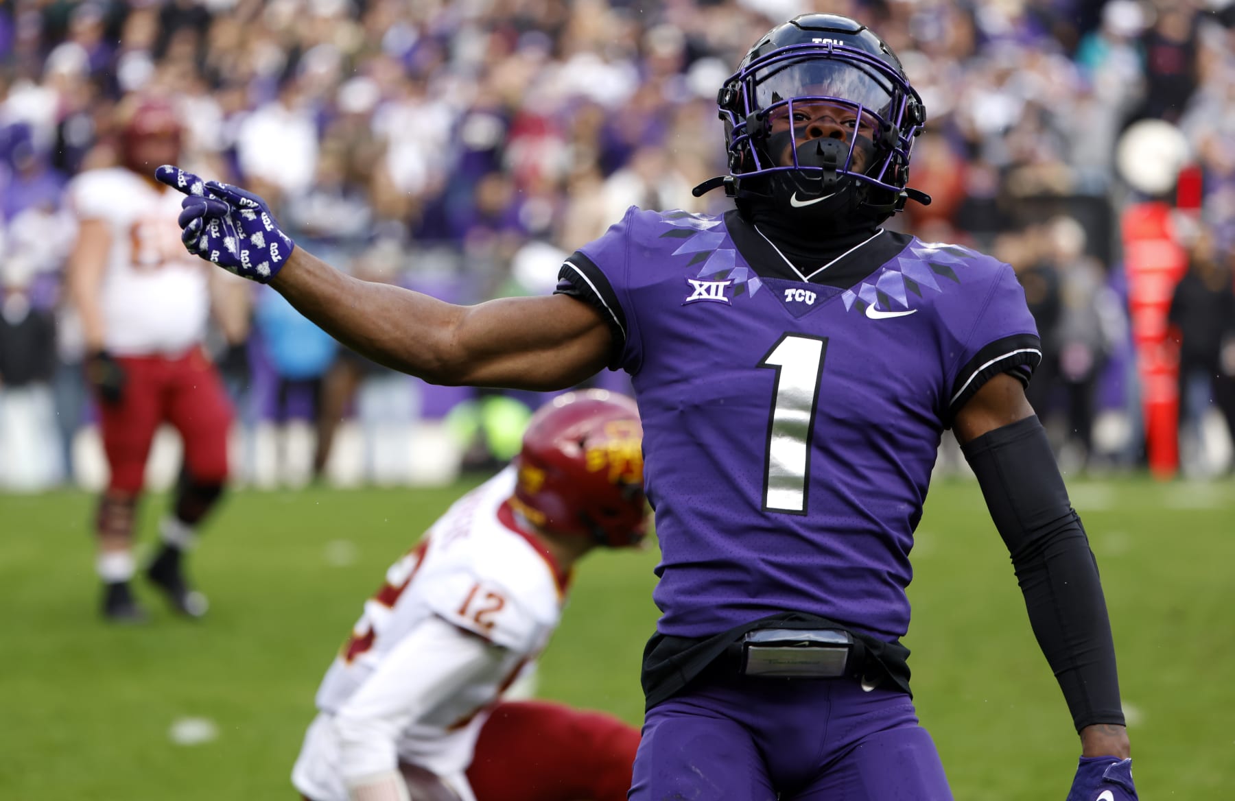 FORT WORTH, TX - NOVEMBER 26: Cornerback Tre'Vius Hodges-Tomlinson #1 of the TCU Horned Frogs reacts after sacking quarterback Hunter Dekkers #12 of the Iowa State Cyclones during the first half at Amon G. Carter Stadium on November 26, 2022 in Fort Worth, Texas. (Photo by Ron Jenkins/Getty Images)