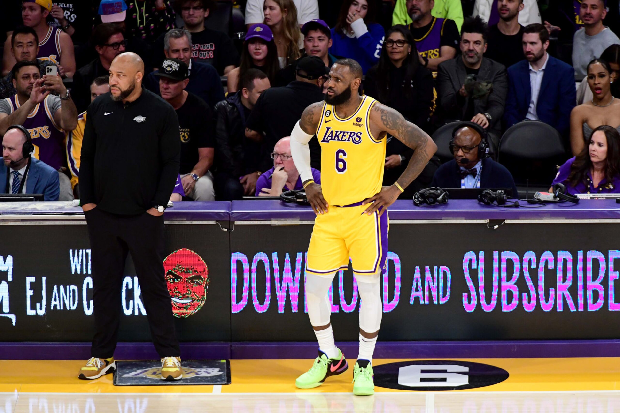 LOS ANGELES, CA - APRIL 24: Head Coach Darvin Ham of the Los Angeles Lakers and LeBron James #6 looks on during Round 1 Game 4 of the 2023 NBA Playoffs on April 24, 2023 at Crypto.Com Arena in Los Angeles, California. NOTE TO USER: User expressly acknowledges and agrees that, by downloading and/or using this Photograph, user is consenting to the terms and conditions of the Getty Images License Agreement. Mandatory Copyright Notice: Copyright 2023 NBAE (Photo by Adam Pantozzi/NBAE via Getty Images)