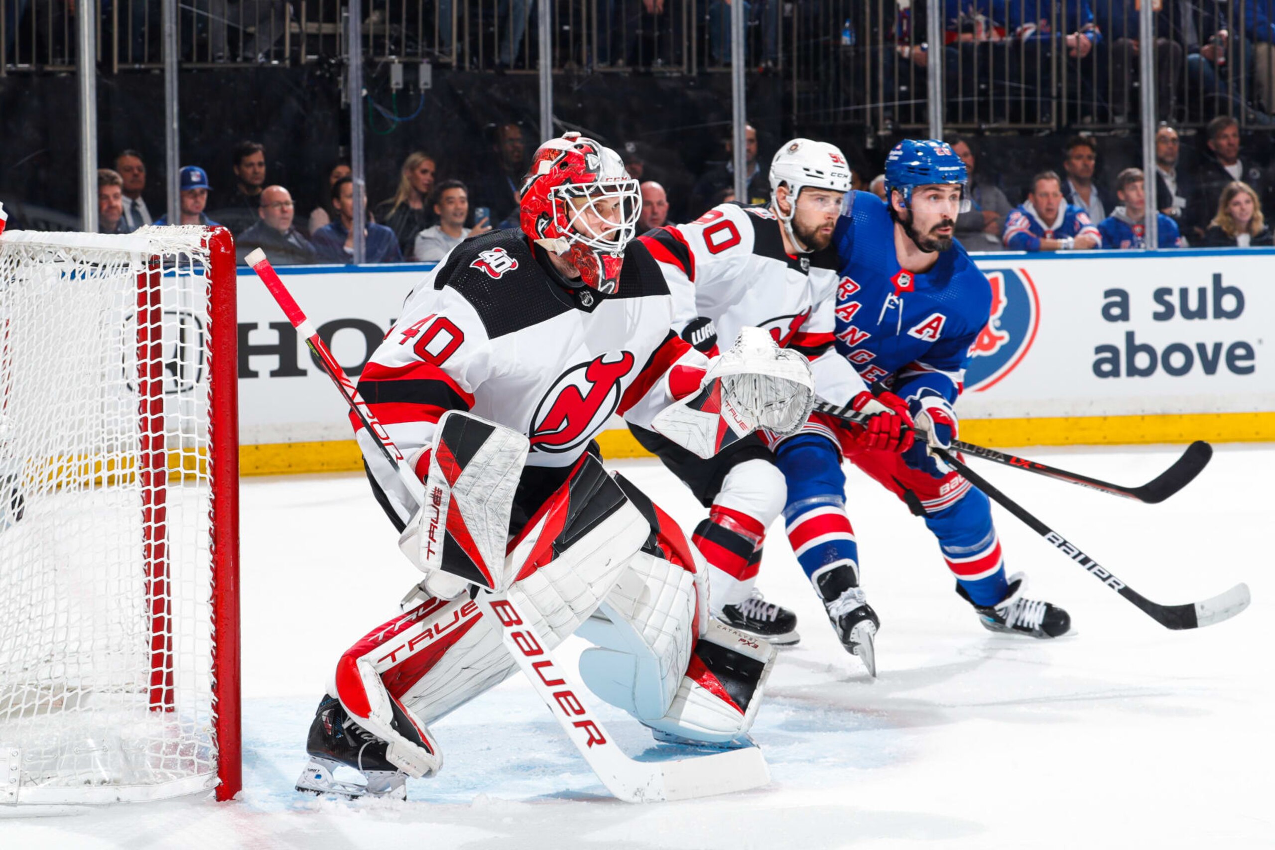 NEW YORK, NEW YORK - APRIL 22:  Akira Schmid #40 of the New Jersey Devils tends the net against the New York Rangers in Game Three of the First Round of the 2023 Stanley Cup Playoffs at Madison Square Garden on April 22, 2023 in New York City. (Photo by Jared Silber/NHLI via Getty Images)