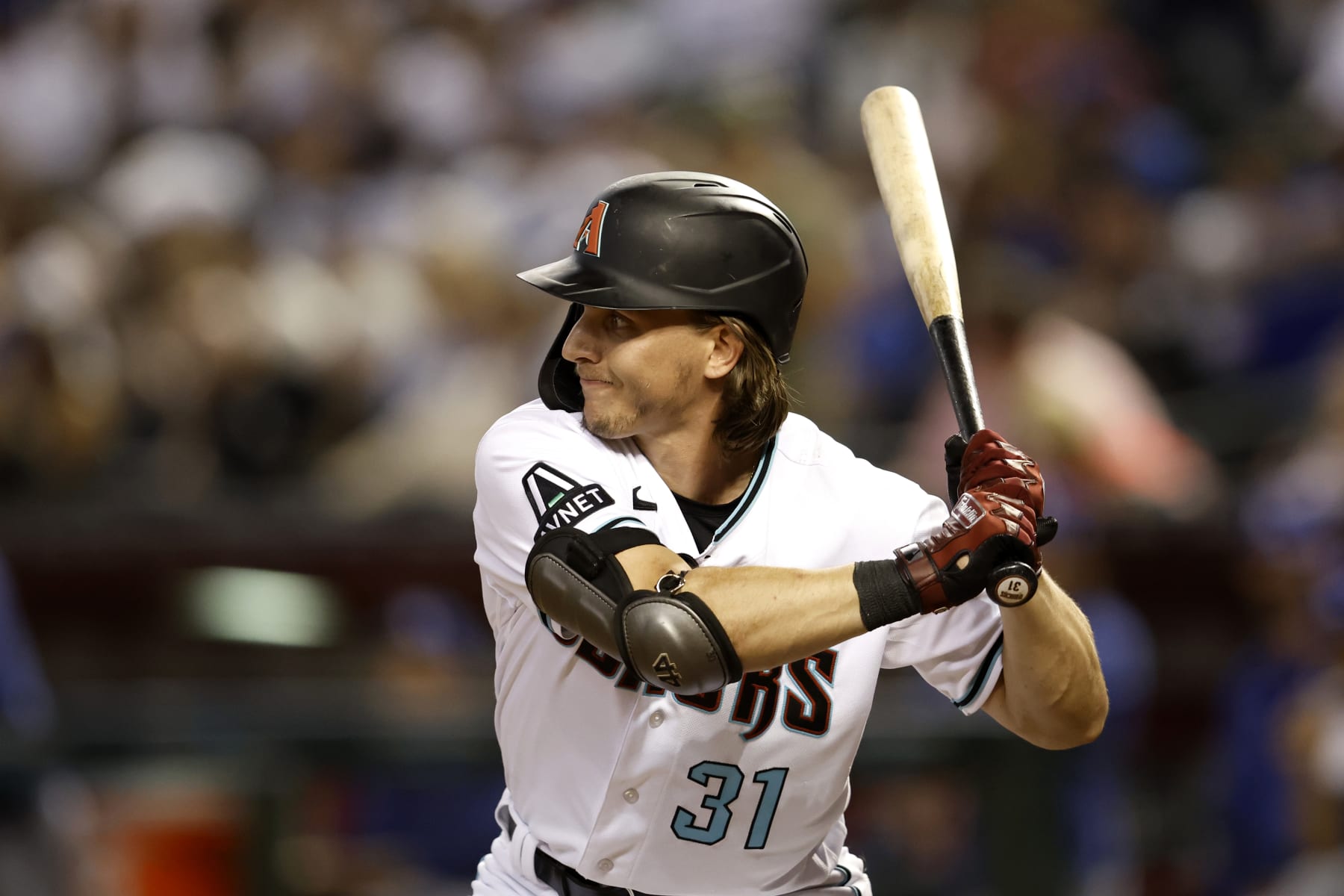 PHOENIX, ARIZONA - APRIL 08: Jake McCarthy #31 of the Arizona Diamondbacks bats against the Los Angeles Dodgers during the game at Chase Field on April 08, 2023 in Phoenix, Arizona. The Diamondbacks defeated the Dodgers 12-8. (Photo by Chris Coduto/Getty Images)