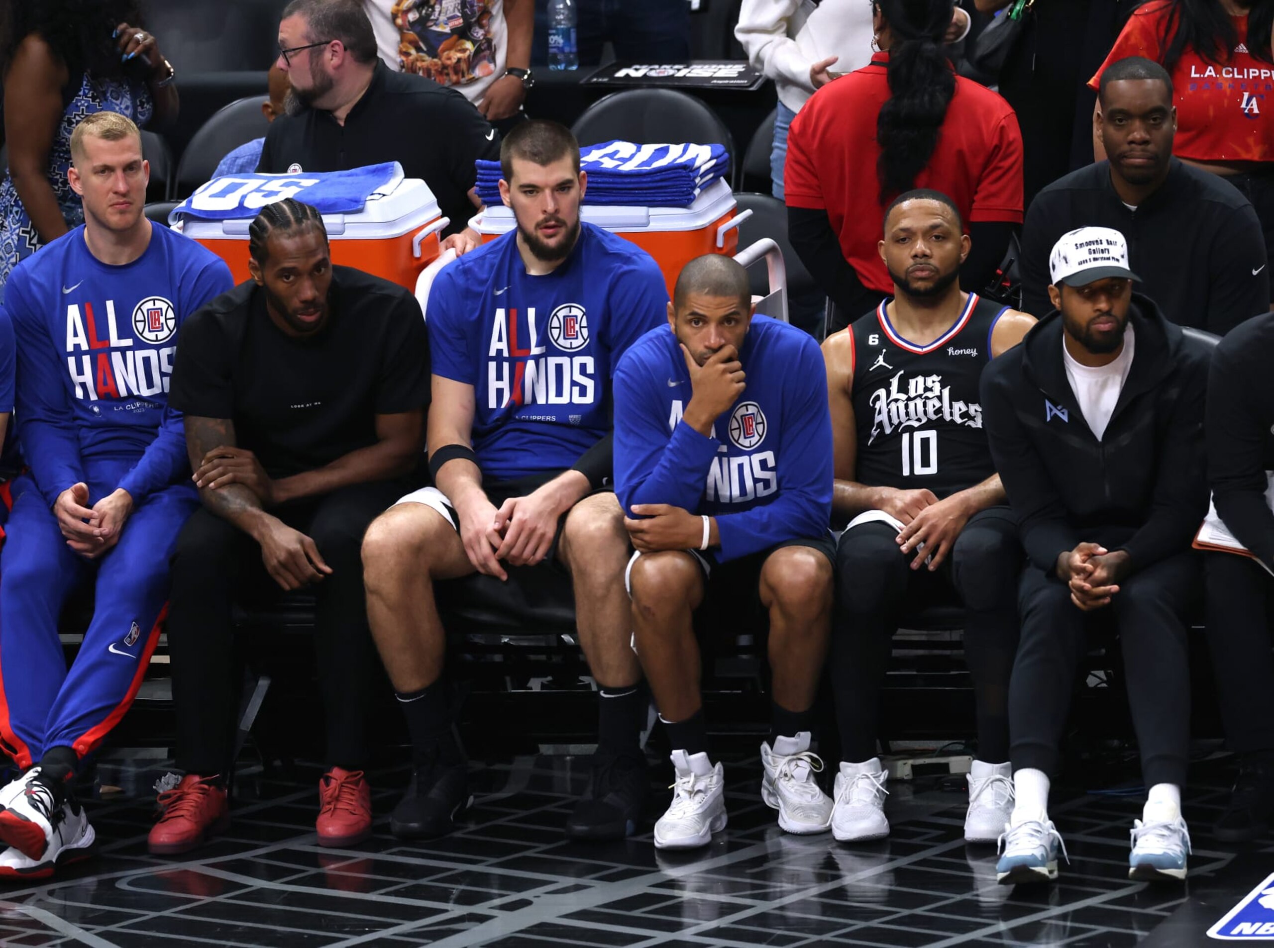 LOS ANGELES, CALIFORNIA - APRIL 22: (L-R) Mason Plumlee #44, Kawhi Leonard #2, Ivica Zubac #40, Nicolas Batum #33, Eric Gordon #10 and Paul George #3 of the LA Clippers watch play during a 112-100 loss to the Phoenix Suns during Game Four of the Western Conference First Round Playoffs at Crypto.com Arena on April 22, 2023 in Los Angeles, California. NOTE TO USER: User expressly acknowledges and agrees that, by downloading and or using this photograph, User is consenting to the terms and conditions of the Getty Images License Agreement. (Photo by Harry How/Getty Images) LOS ANGELES, CALIFORNIA - APRIL 22: (L-R) Mason Plumlee #44, Kawhi Leonard #2, Ivica Zubac #40, Nicolas Batum #33, Eric Gordon #10 and Paul George #3 of the LA Clippers watch play during a 112-100 loss to the Phoenix Suns during Game Four of the Western Conference First Round Playoffs at Crypto.com Arena on April 22, 2023 in Los Angeles, California. NOTE TO USER: User expressly acknowledges and agrees that, by downloading and or using this photograph, User is consenting to the terms and conditions of the Getty Images License Agreement. (Photo by Harry How/Getty Images)