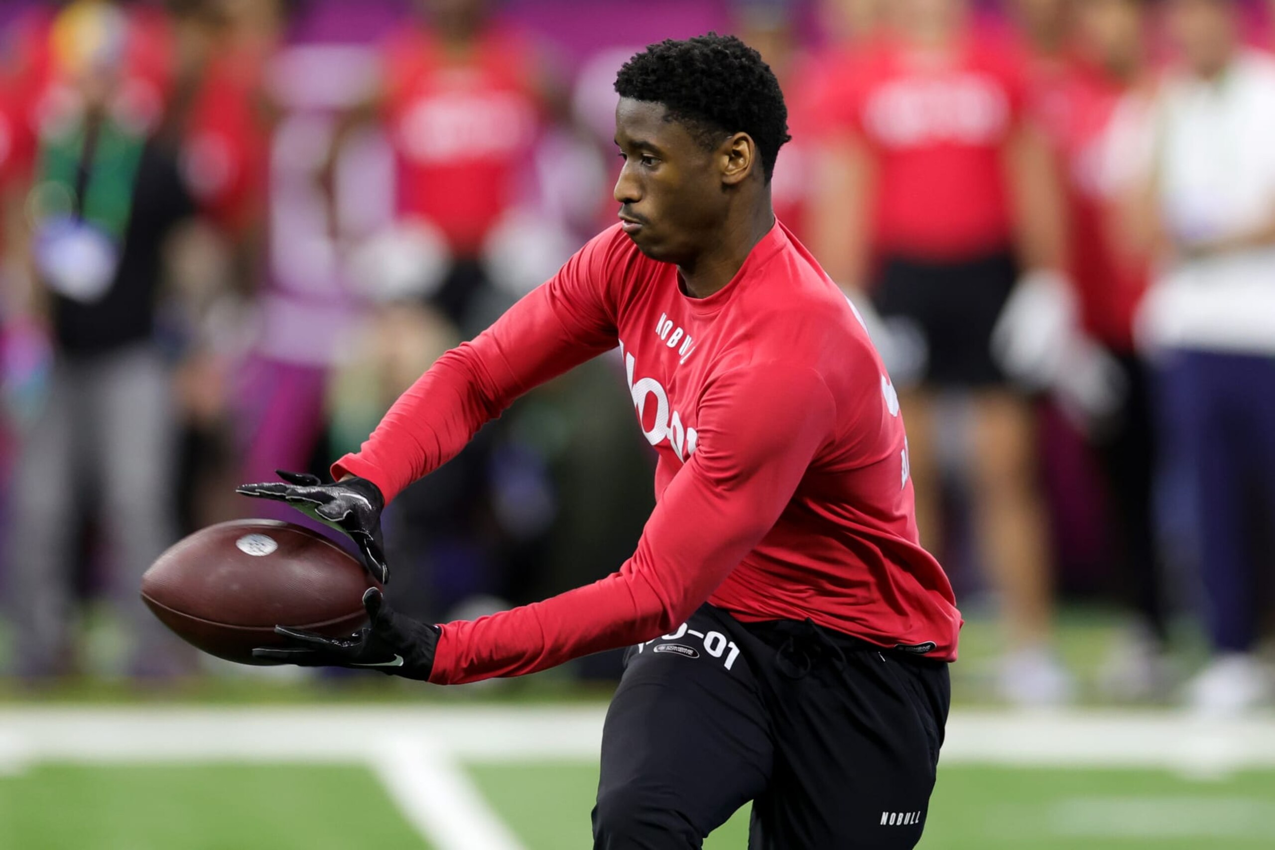 INDIANAPOLIS, INDIANA - MARCH 04: Wide receiver Jordan Addison of Southern California participates in a drill during the NFL Combine at Lucas Oil Stadium on March 04, 2023 in Indianapolis, Indiana. (Photo by Stacy Revere/Getty Images)