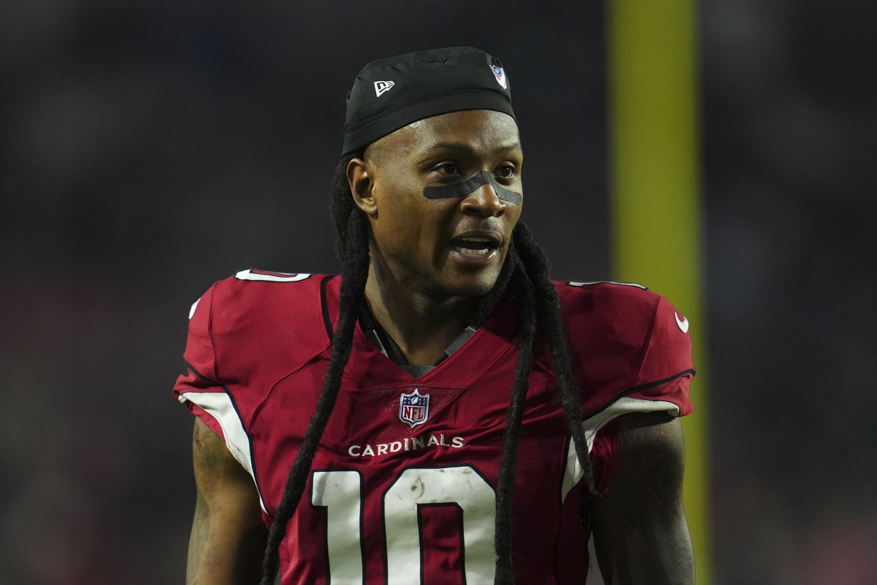 GLENDALE, AZ - DECEMBER 12: DeAndre Hopkins #10 of the Arizona Cardinals runs off of the field against the New England Patriots at State Farm Stadium on December 12, 2022 in Glendale, Arizona. (Photo by Cooper Neill/Getty Images)
