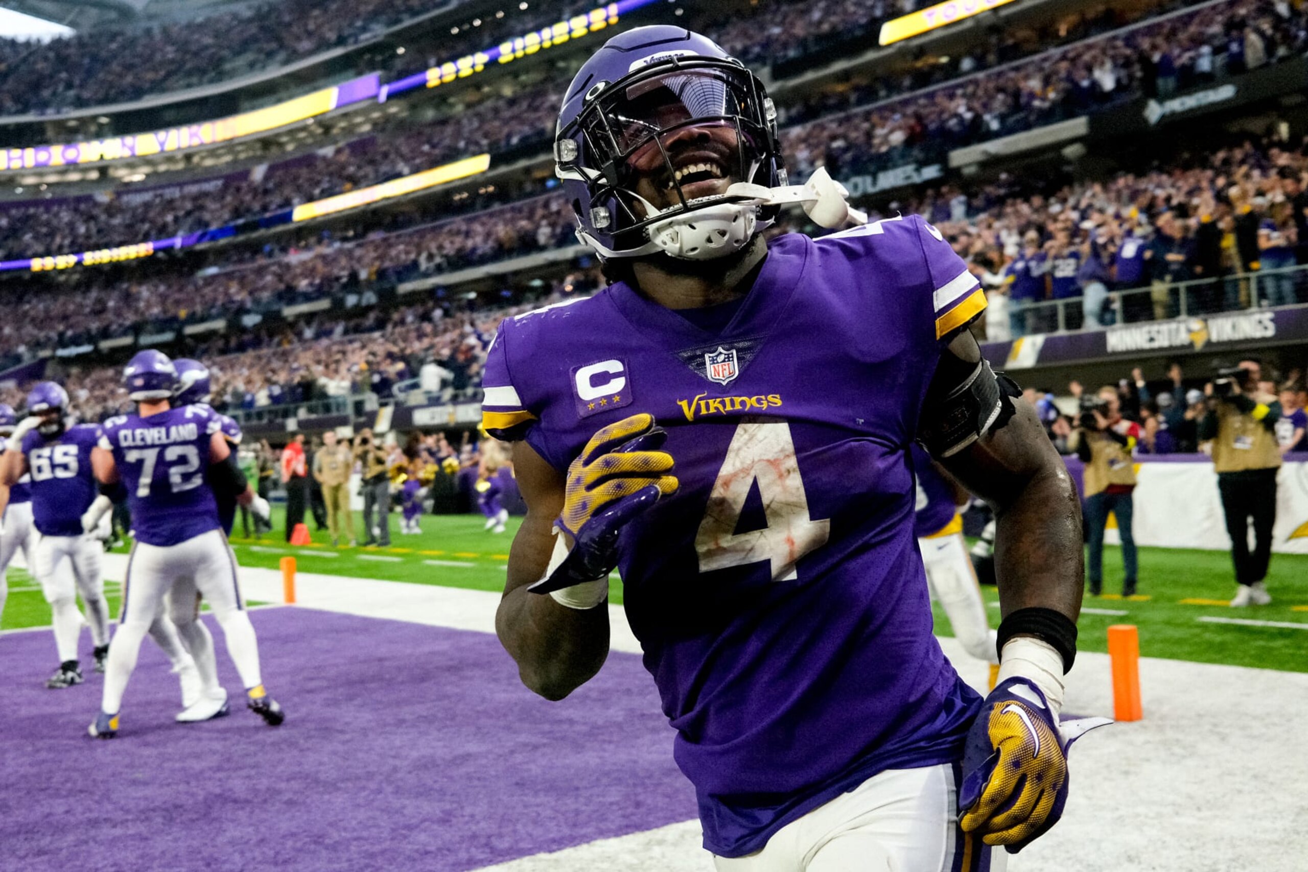 MINNEAPOLIS, MINNESOTA - DECEMBER 17: Dalvin Cook #4 of the Minnesota Vikings celebrates after rushing for a touchdown against the Indianapolis Colts during the fourth quarter of the game at U.S. Bank Stadium on December 17, 2022 in Minneapolis, Minnesota. (Photo by Stephen Maturen/Getty Images)
