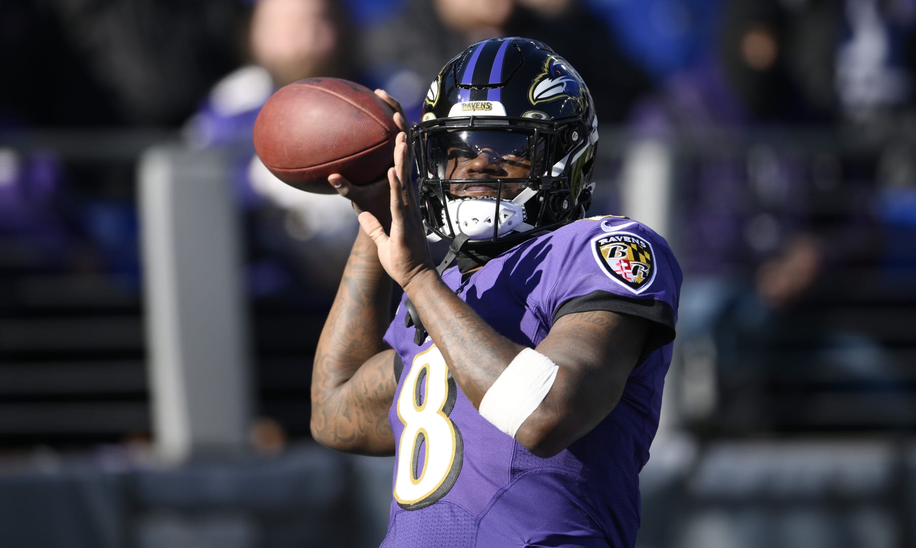 Baltimore Ravens quarterback Lamar Jackson (8) warms up prior to the start of an NFL football game against the Carolina Panthers Sunday, Nov. 20, 2022, in Baltimore. (AP Photo/Nick Wass)