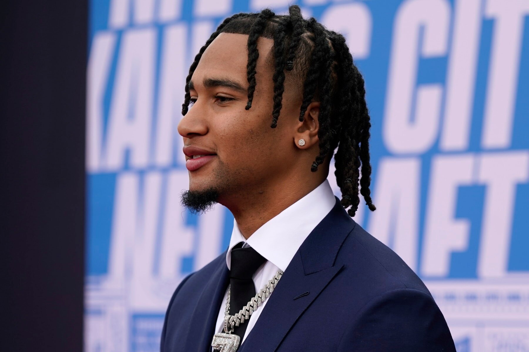 Ohio State quarterback C.J. Stroud arrives on the red carpet before the first round of the NFL football draft, Thursday, April 27, 2023, in Kansas City, Mo. (AP Photo/Charlie Riedel)