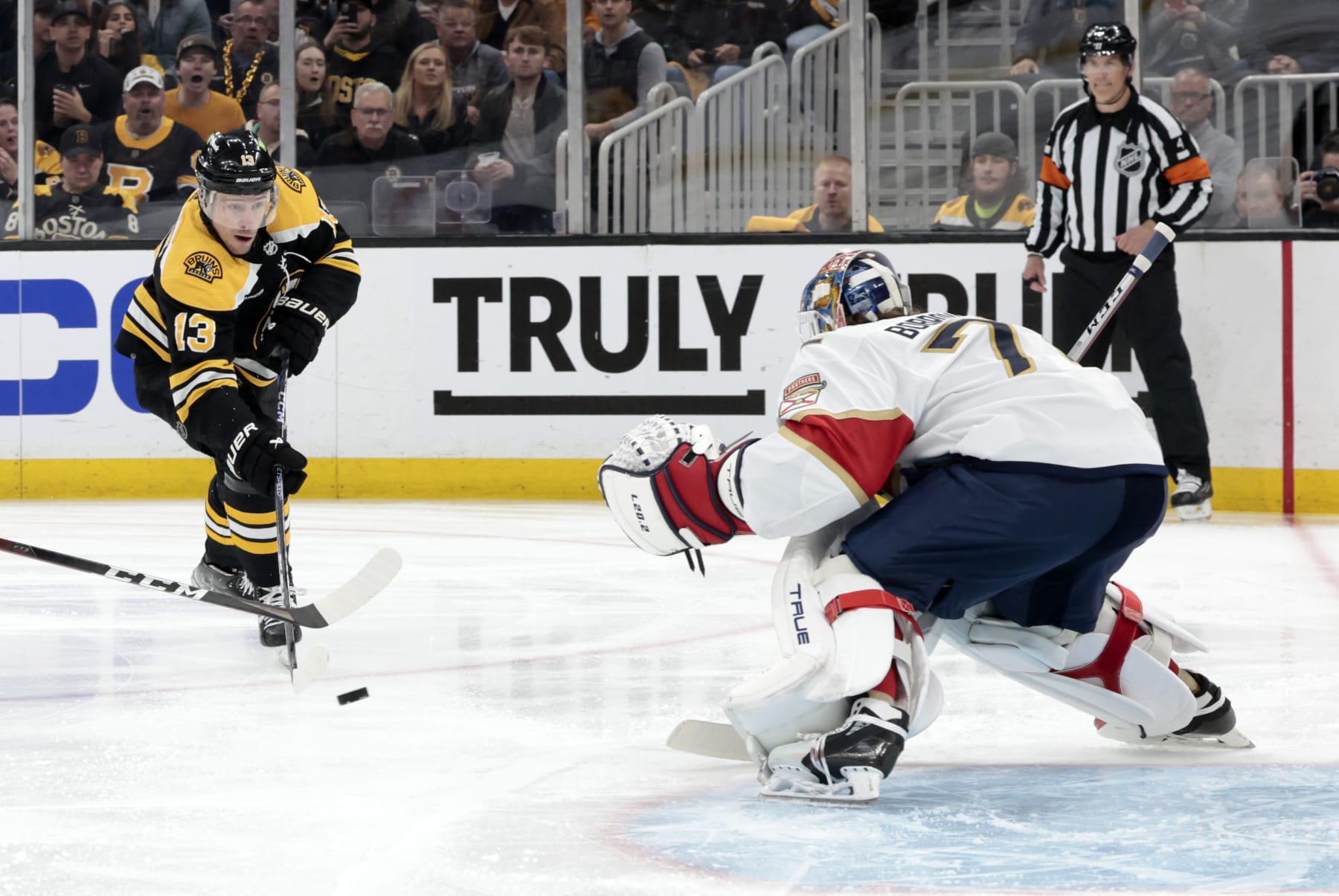 BOSTON, MA - APRIL 26: Boston Bruins center Charlie Coyle (13) shoots on Florida Panthers goalie Sergei Bobrovsky (72) during Game 5 of an Eastern Conference First Round playoff contest between the Boston Bruins and the Florida Panthers on April 26, 2023, at TD Garden in Boston, Massachusetts.(Photo by Fred Kfoury III/Icon Sportswire via Getty Images)