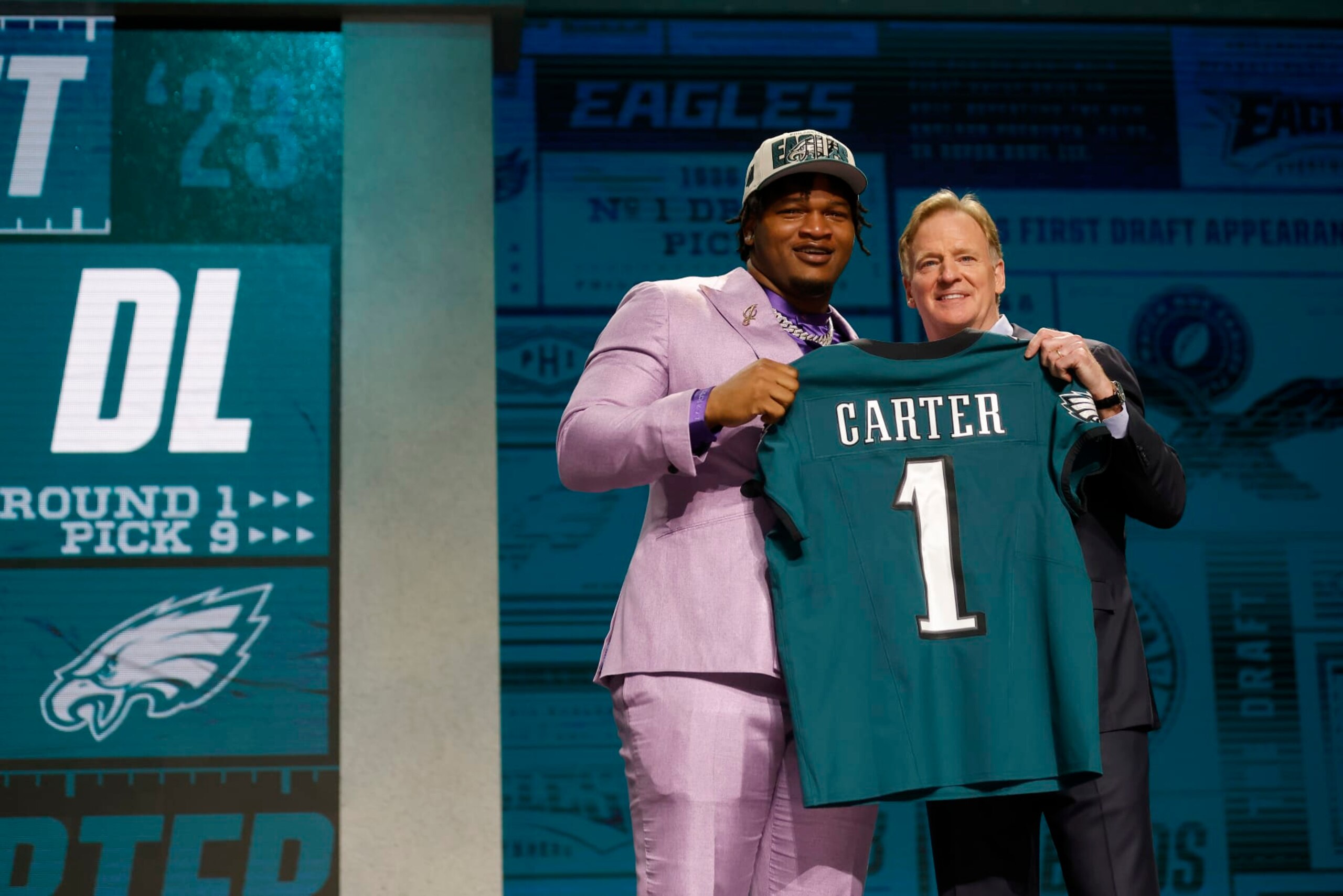 KANSAS CITY, MISSOURI - APRIL 27: (L-R) Jalen Carter poses with NFL Commissioner Roger Goodell after being selected ninth overall by the Philadelphia Eagles during the first round of the 2023 NFL Draft at Union Station on April 27, 2023 in Kansas City, Missouri. (Photo by David Eulitt/Getty Images)