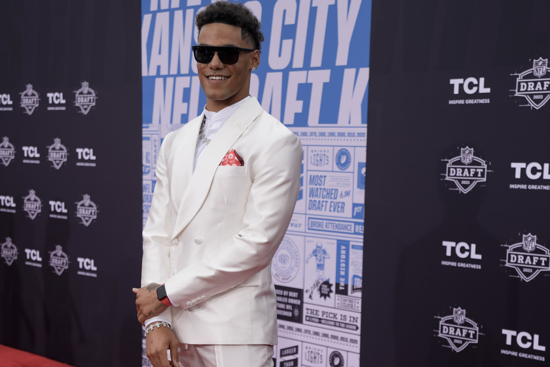 Oregon defensive back Christian Gonzalez arrives on the red carpet before the first round of the NFL football draft, Thursday, April 27, 2023, in Kansas City, Mo. (AP Photo/Charlie Riedel)
