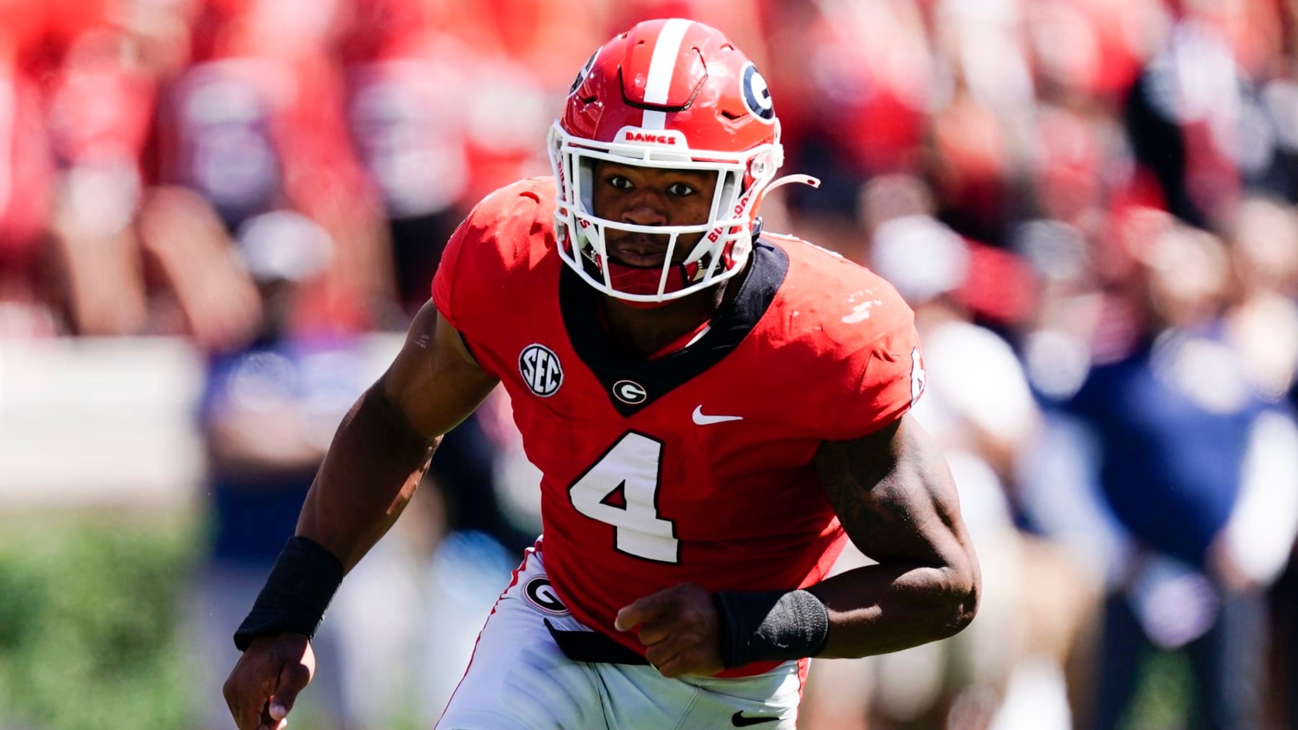 Georgia linebacker Nolan Smith (4) rushes a punt during an NCAA college football game against the Kent State Saturday, Sept. 24, 2022, in Athens, Ga. (AP Photo/John Bazemore)