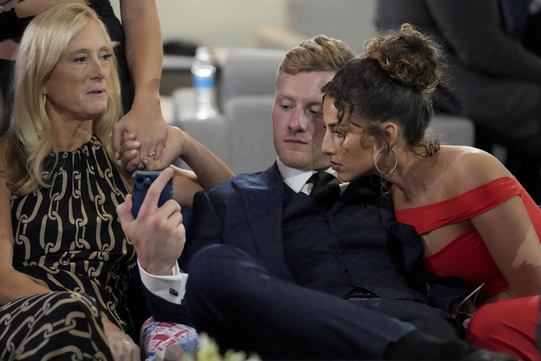 Kentucky quarterback Will Levis waits in the Green Room with family at the 2023 NFL Draft, Thursday, April 27, 2023, in Kansas City, MO. (AP Photo/Doug Benc)