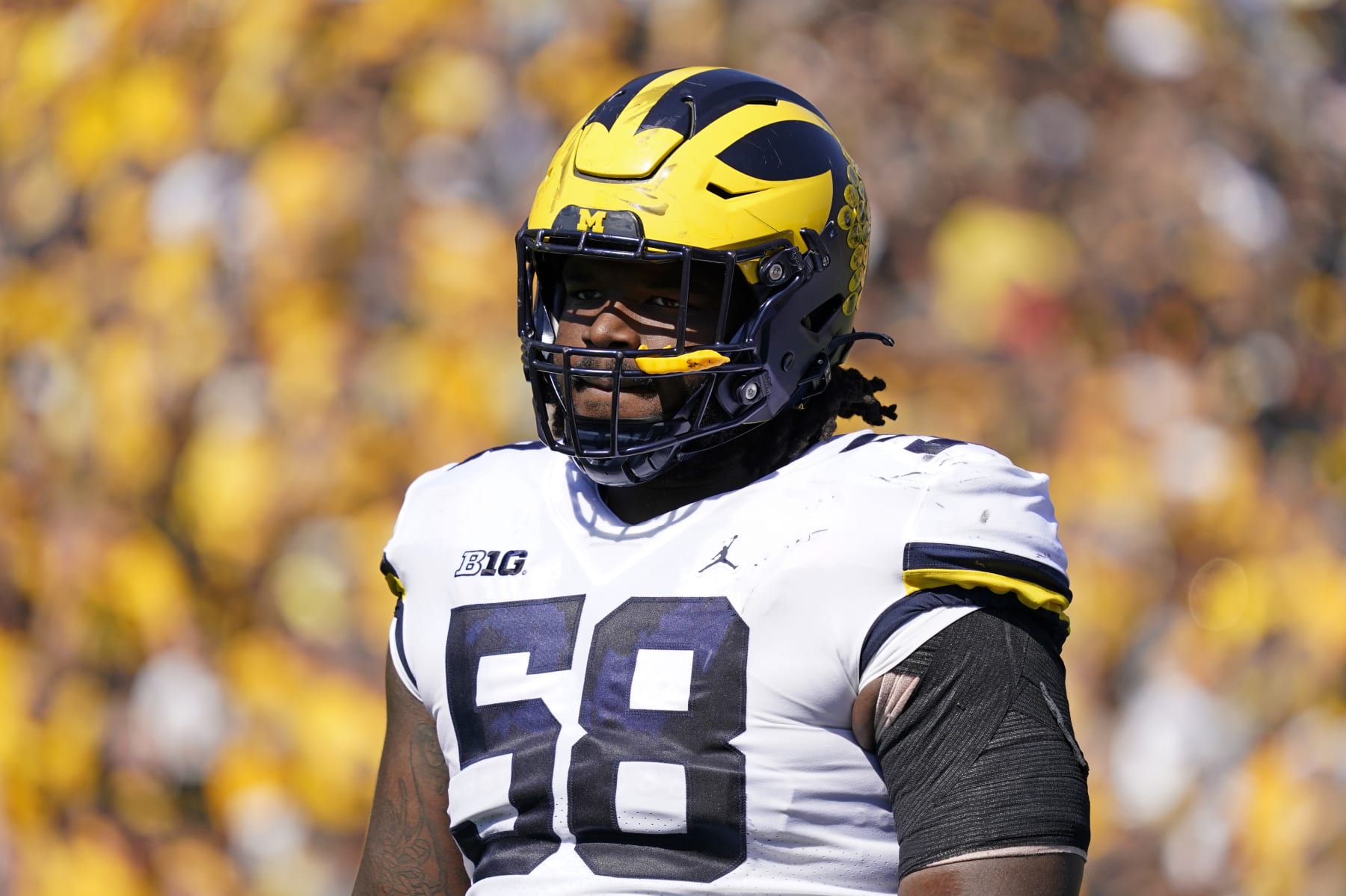 Michigan defensive lineman Mazi Smith stands on the field during the first half of an NCAA college football game against Iowa, Saturday, Oct. 1, 2022, in Iowa City, Iowa. (AP Photo/Charlie Neibergall)