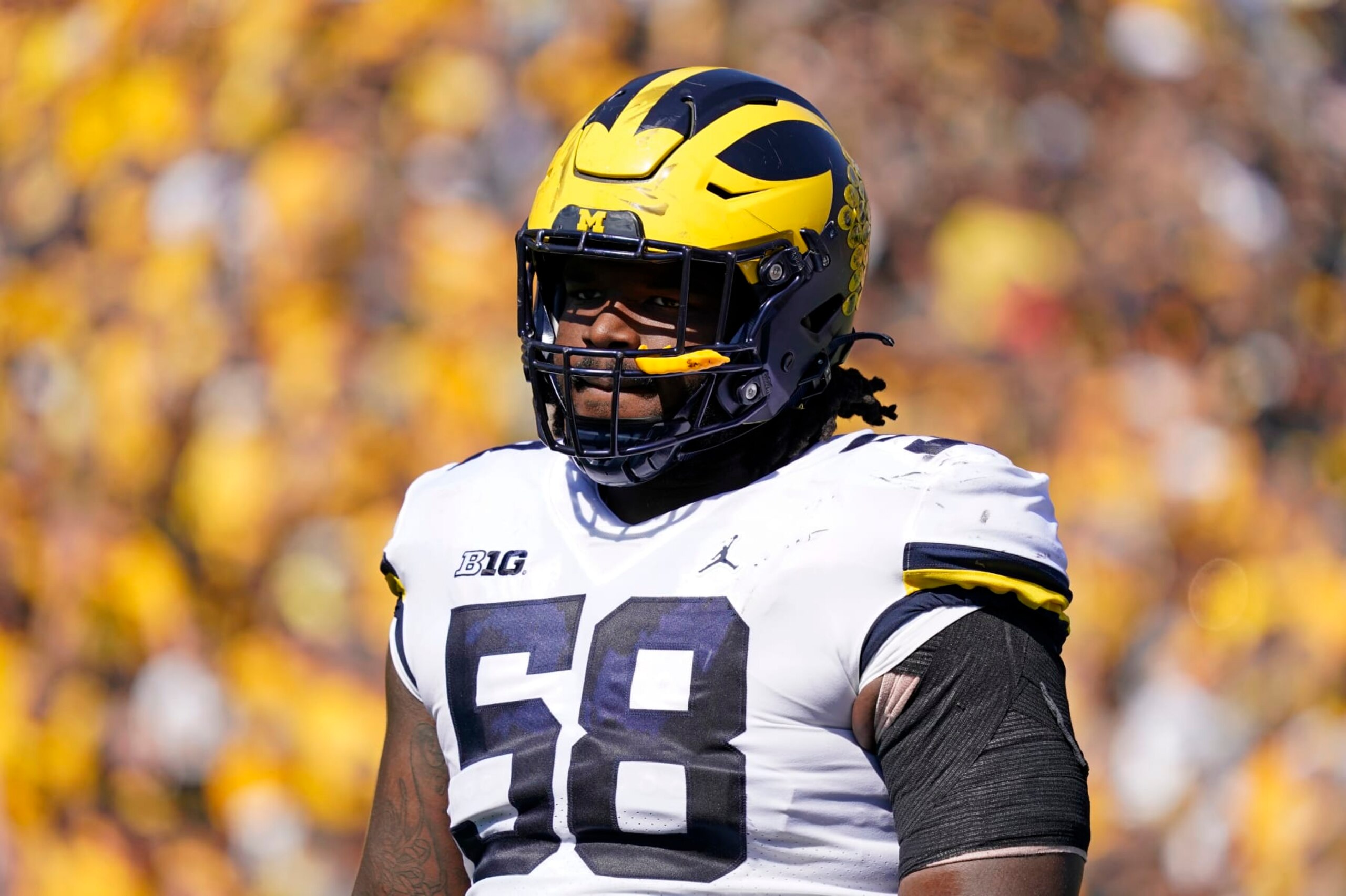 Michigan defensive lineman Mazi Smith stands on the field during the first half of an NCAA college football game against Iowa, Saturday, Oct. 1, 2022, in Iowa City, Iowa. (AP Photo/Charlie Neibergall) Michigan defensive lineman Mazi Smith stands on the field during the first half of an NCAA college football game against Iowa, Saturday, Oct. 1, 2022, in Iowa City, Iowa. (AP Photo/Charlie Neibergall)