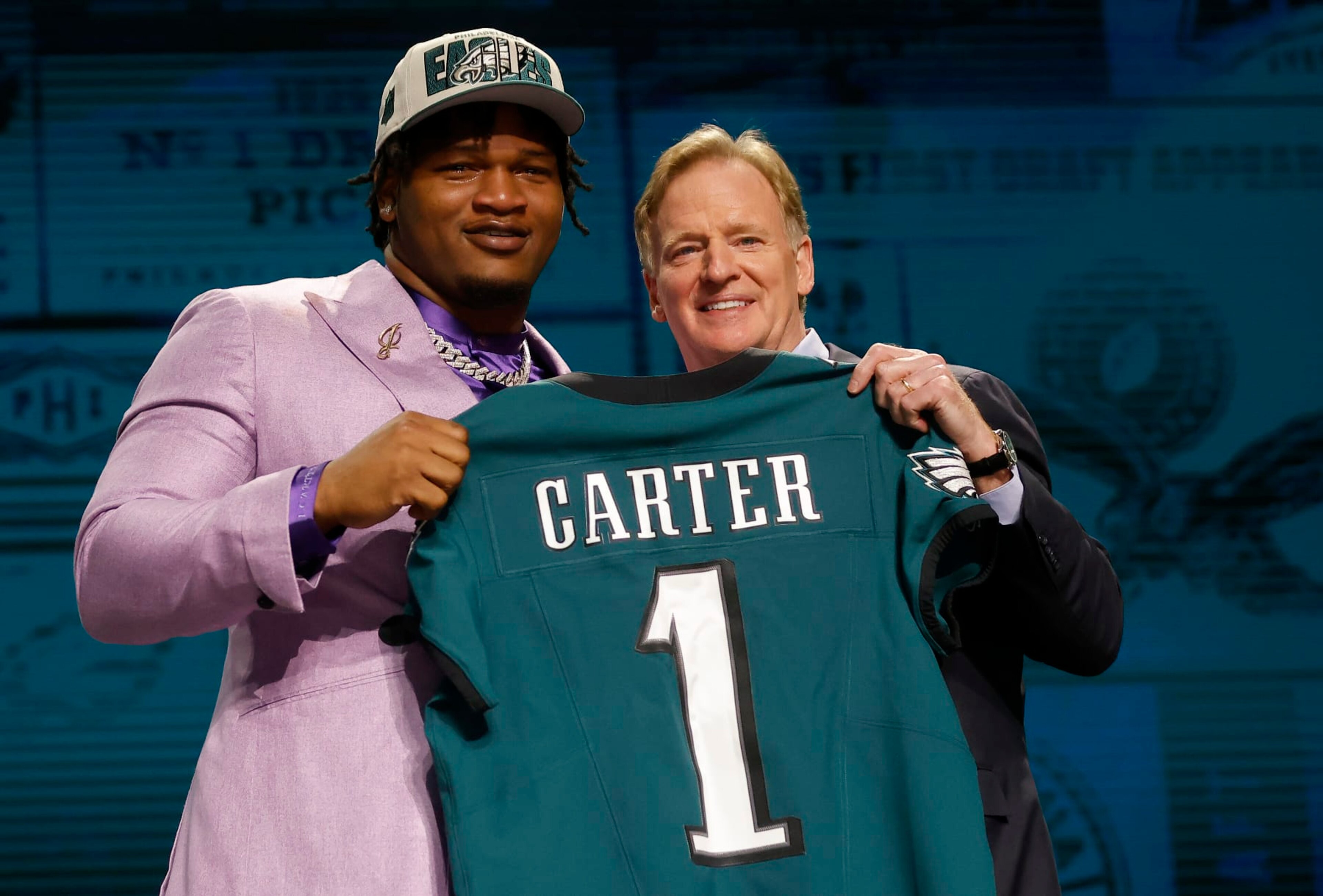 KANSAS CITY, MISSOURI - APRIL 27: (L-R) Jalen Carter poses with NFL Commissioner Roger Goodell after being selected ninth overall by the Philadelphia Eagles during the first round of the 2023 NFL Draft at Union Station on April 27, 2023 in Kansas City, Missouri. (Photo by David Eulitt/Getty Images) KANSAS CITY, MISSOURI - APRIL 27: (L-R) Jalen Carter poses with NFL Commissioner Roger Goodell after being selected ninth overall by the Philadelphia Eagles during the first round of the 2023 NFL Draft at Union Station on April 27, 2023 in Kansas City, Missouri. (Photo by David Eulitt/Getty Images)