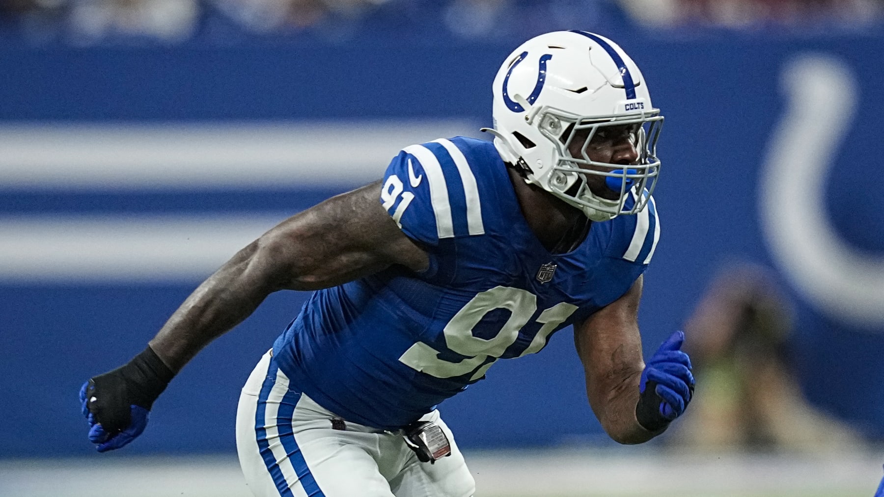 Indianapolis Colts defensive end Yannick Ngakoue (91) plays against the Washington Commanders in the first half of an NFL football game in Indianapolis, Sunday, Oct. 30, 2022. (AP Photo/Darron Cummings)