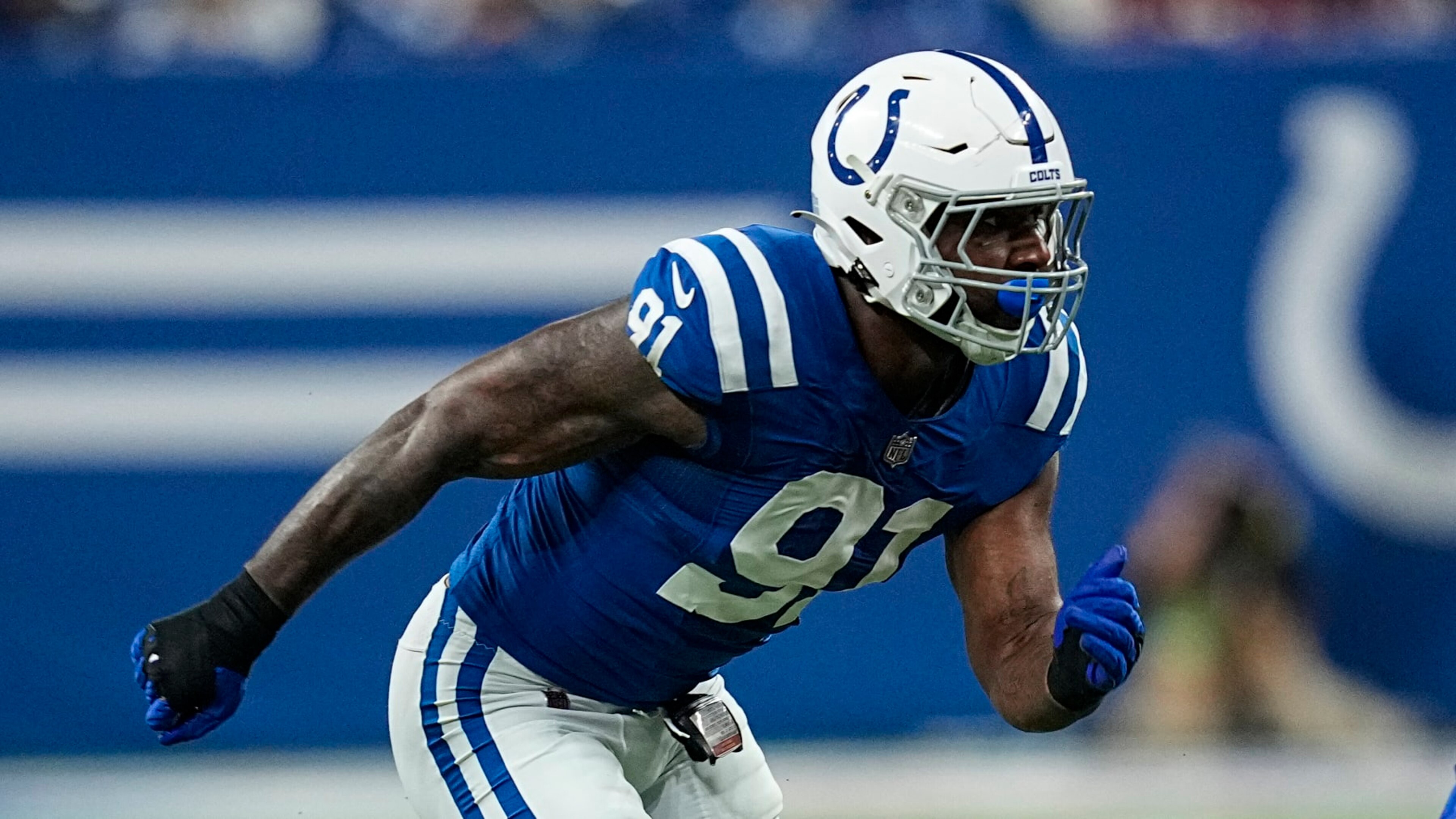 Indianapolis Colts defensive end Yannick Ngakoue (91) plays against the Washington Commanders in the first half of an NFL football game in Indianapolis, Sunday, Oct. 30, 2022. (AP Photo/Darron Cummings)