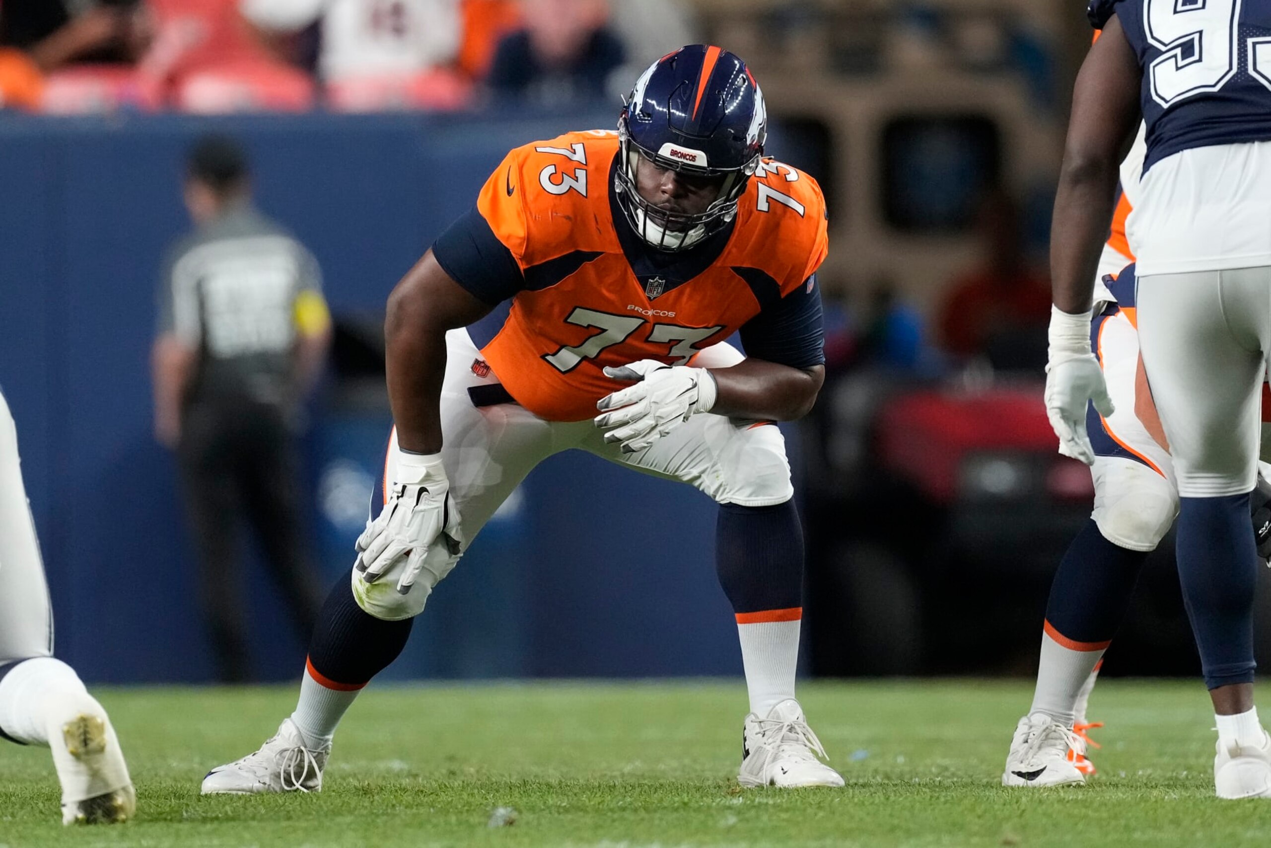 Denver Broncos offensive tackle Cameron Fleming (73) lines up against the Dallas Cowboys during the first half of an NFL preseason football game, Saturday, Aug. 13, 2022, in Denver. (AP Photo/David Zalubowski) Denver Broncos offensive tackle Cameron Fleming (73) lines up against the Dallas Cowboys during the first half of an NFL preseason football game, Saturday, Aug. 13, 2022, in Denver. (AP Photo/David Zalubowski)