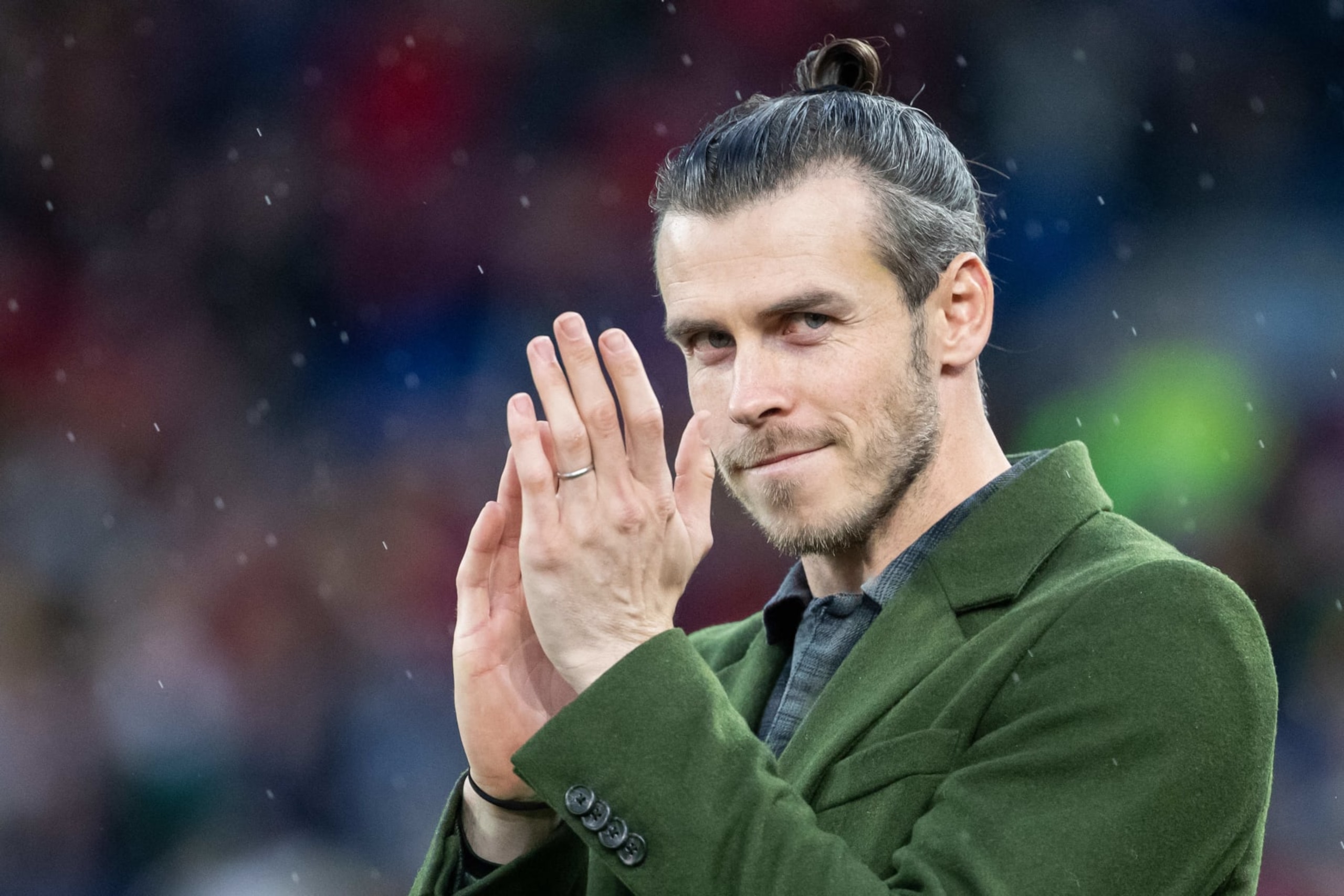 CARDIFF, WALES - MARCH 28: Gareth Bale gives a speech to the supporters of Wales during the UEFA EURO 2024 Qualifying Round match between Wales and Latvia at the Cardiff City Stadium on March 28, 2023 in Cardiff, Wales. (Photo by Athena Pictures/Getty Images)