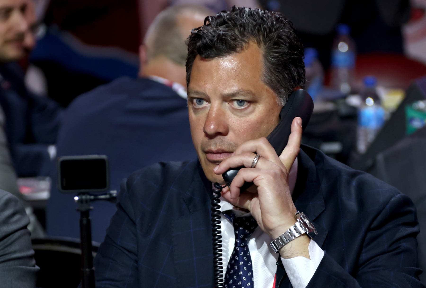 MONTREAL, QUEBEC - JULY 08: General manager Bill Guerin 
of the Minnesota Wild looks on from the draft table during the 2022 Upper Deck NHL Draft at Bell Centre on July 08, 2022 in Montreal, Quebec. (Photo by Dave Sandford/NHLI via Getty Images)