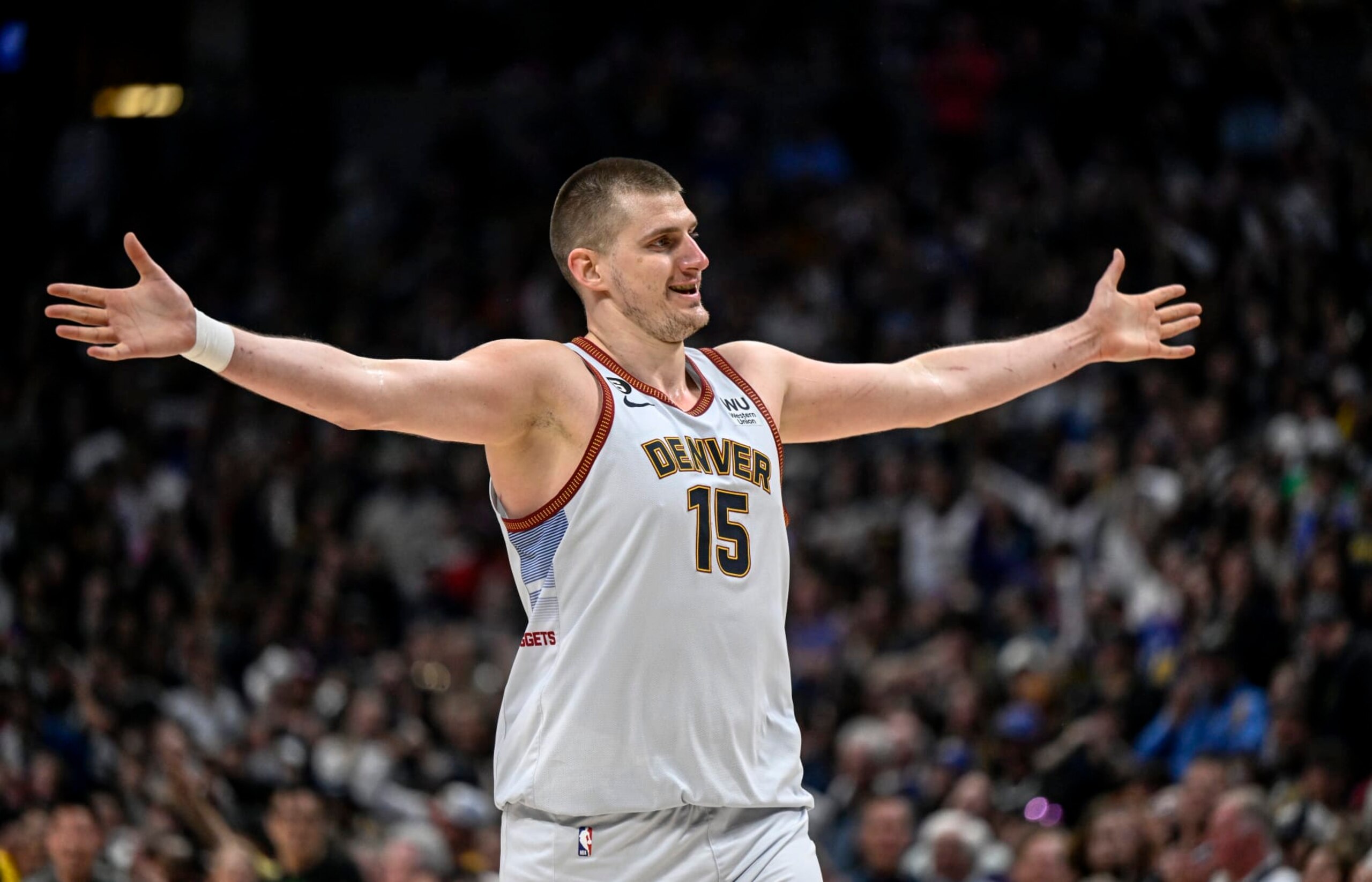 DENVER, CO - APRIL 25: Nikola Jokic (15) of the Denver Nuggets spreads his arms to made referee Scott Foster (48) and the rest of the crew aware that he did not feel he was being officiated the same as his Minnesota Timberwolves counterparts during the fourth quarter of Denvers 112-109 win at Ball Arena in Denver on Tuesday, April 25, 2023. Denver clinched the best-of-seven series 4-1. (Photo by AAron Ontiveroz/MediaNews Group/The Denver Post via Getty Images)