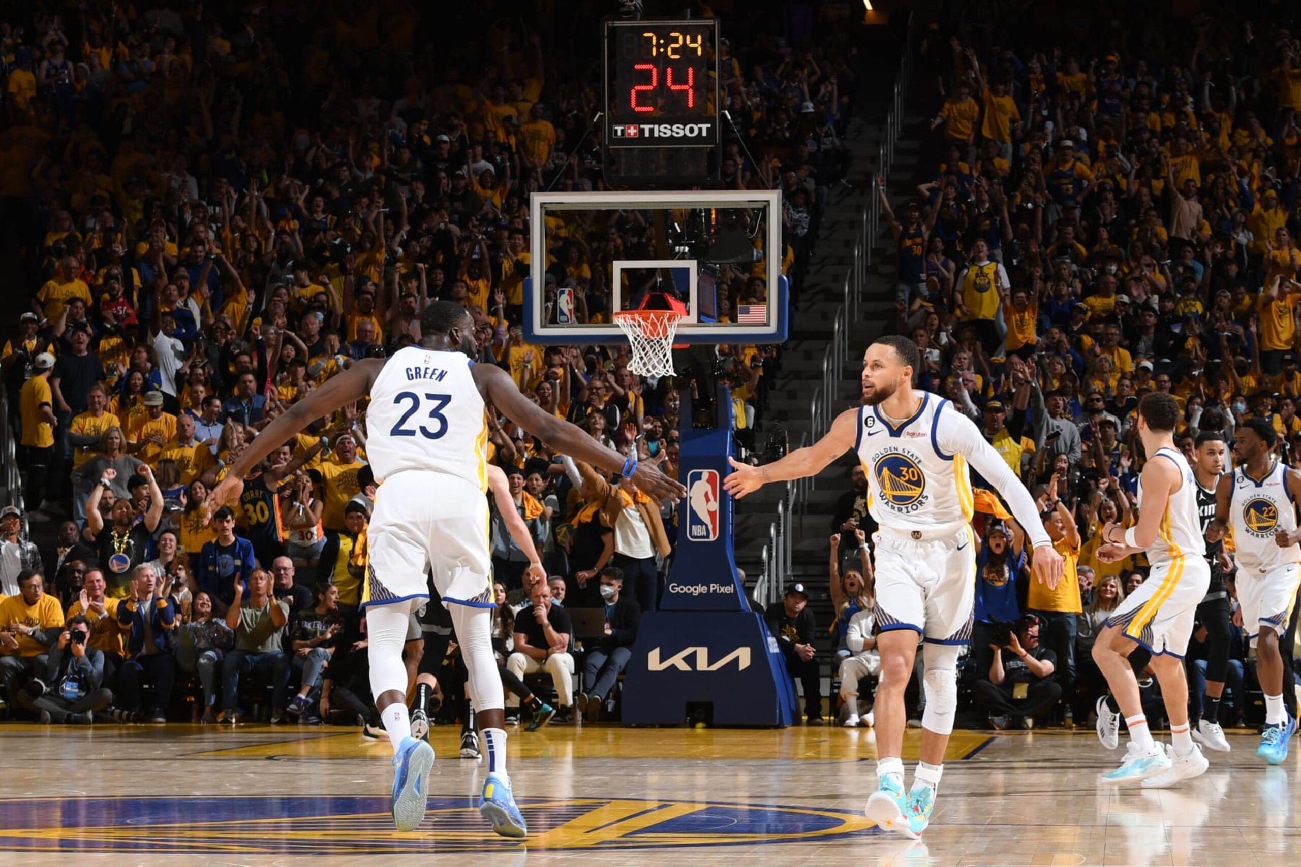 SAN FRANCISCO, CA - APRIL 23: Draymond Green #23 and Stephen Curry #30 of the Golden State Warriors high five during the game against the Sacramento Kings during Round One Game Four of the 2023 NBA Playoffs on April 23, 2023 at Chase Center in San Francisco, California. NOTE TO USER: User expressly acknowledges and agrees that, by downloading and or using this photograph, user is consenting to the terms and conditions of Getty Images License Agreement. Mandatory Copyright Notice: Copyright 2023 NBAE (Photo by Noah Graham/NBAE via Getty Images)