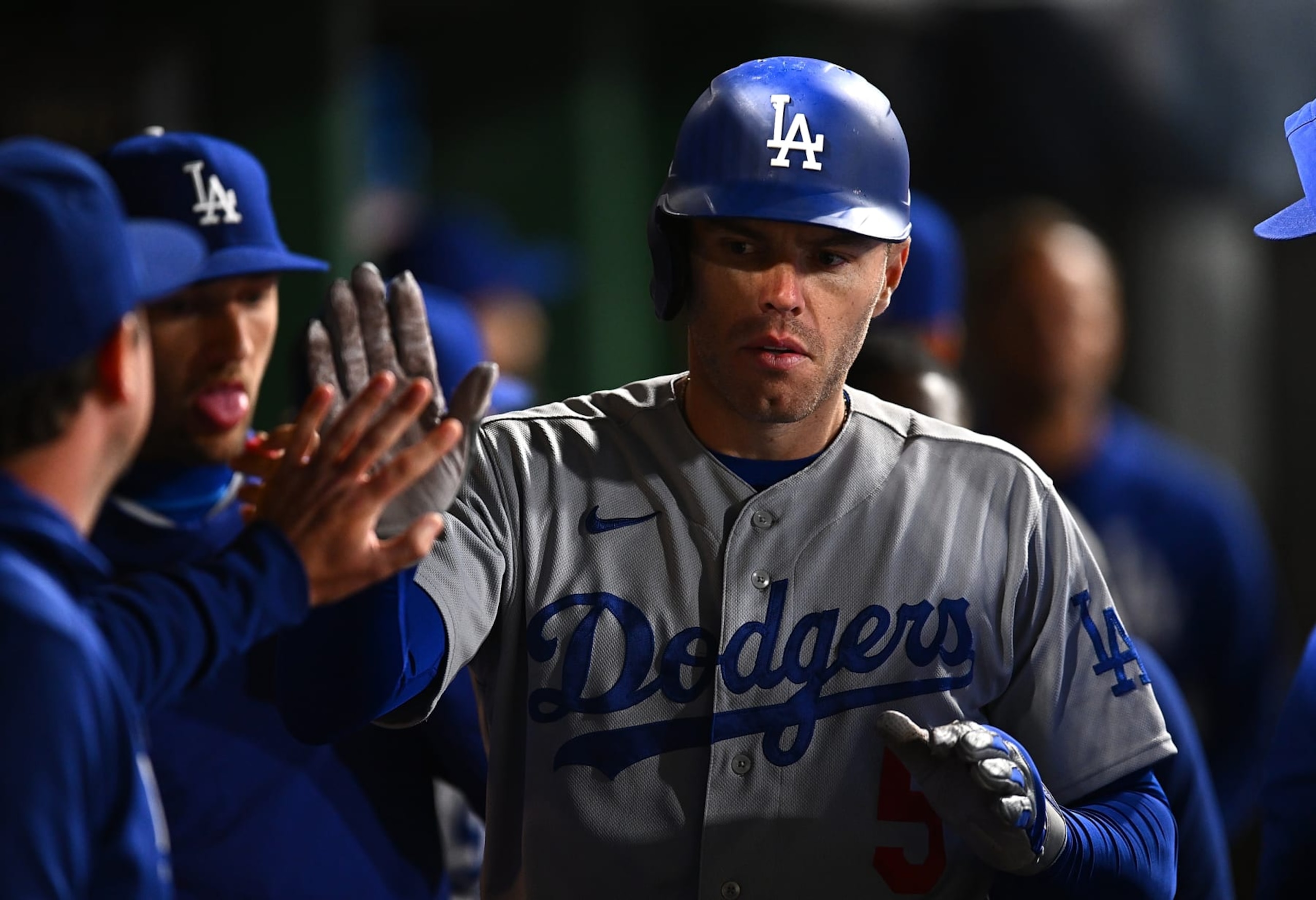 PITTSBURGH, PA - APRIL 26:  Freddie Freeman #5 of the Los Angeles Dodgers celebrates his solo home run with teammates in the dugout during the eighth inning against the Pittsburgh Pirates at PNC Park on April 26, 2023 in Pittsburgh, Pennsylvania. (Photo by Joe Sargent/Getty Images)