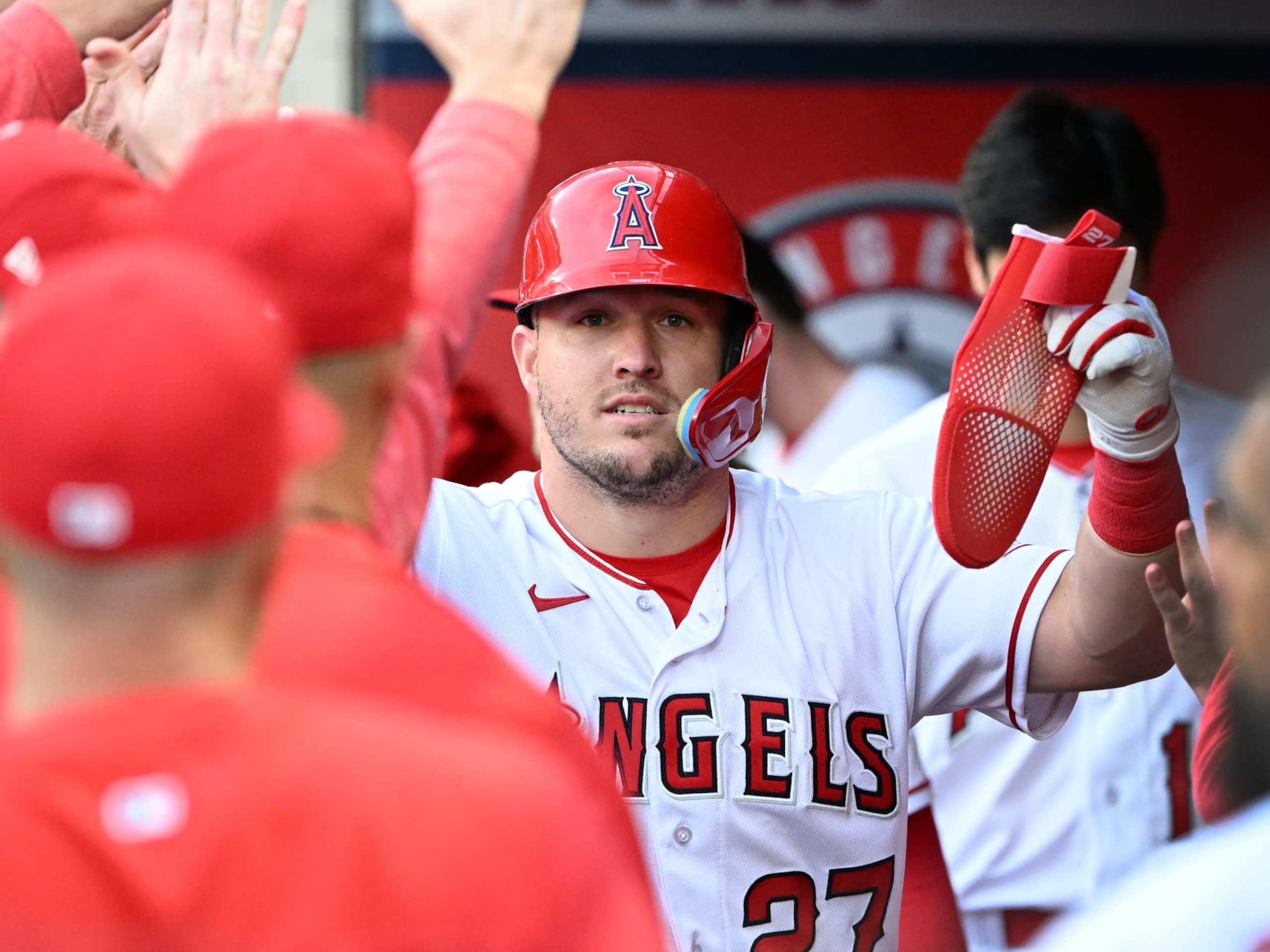 ANAHEIM, CA - APRIL 25: Los Angeles Angels center fielder Mike Trout (27) in the dugout after scoring on an Angels hit in the first inning of an MLB baseball game against the Oakland Athletics played on April 25, 2023 at Angel Stadium in Anaheim, CA. (Photo by John Cordes/Icon Sportswire via Getty Images)