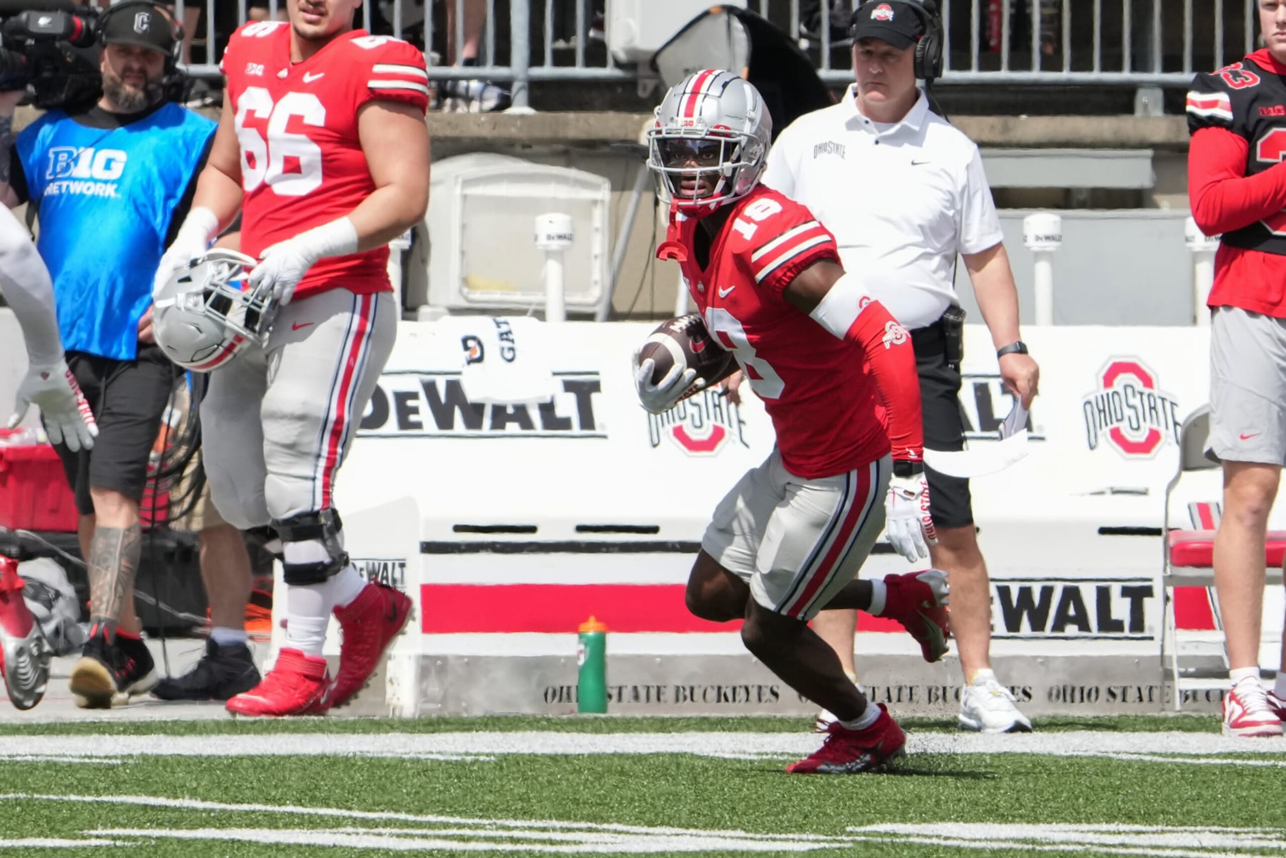 COLUMBUS, OH - APRIL 15: Marvin Harrison Jr. #18 of the Ohio State Buckeyes runs with the ball during the LiFEsports Spring Game, presented by Union Home Mortgage at Ohio Stadium in Columbus, Ohio on April 15, 2023. (Photo by Jason Mowry/Icon Sportswire via Getty Images)