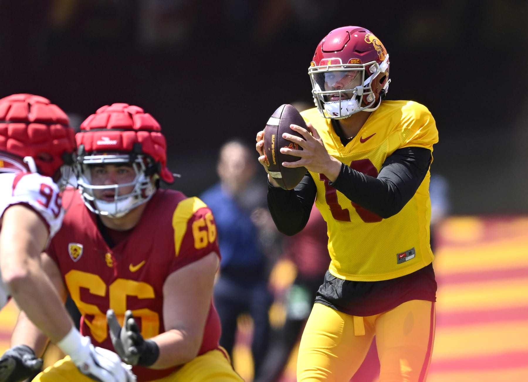 LOS ANGELES, CA - APRIL 15: Quarterback Caleb Williams #13 of the USC Trojans takes a snap during the USC spring game at the Los Angeles Memorial Coliseum on April 15, 2023 in Los Angeles, California. (Photo by Jayne Kamin-Oncea/Getty Images)
