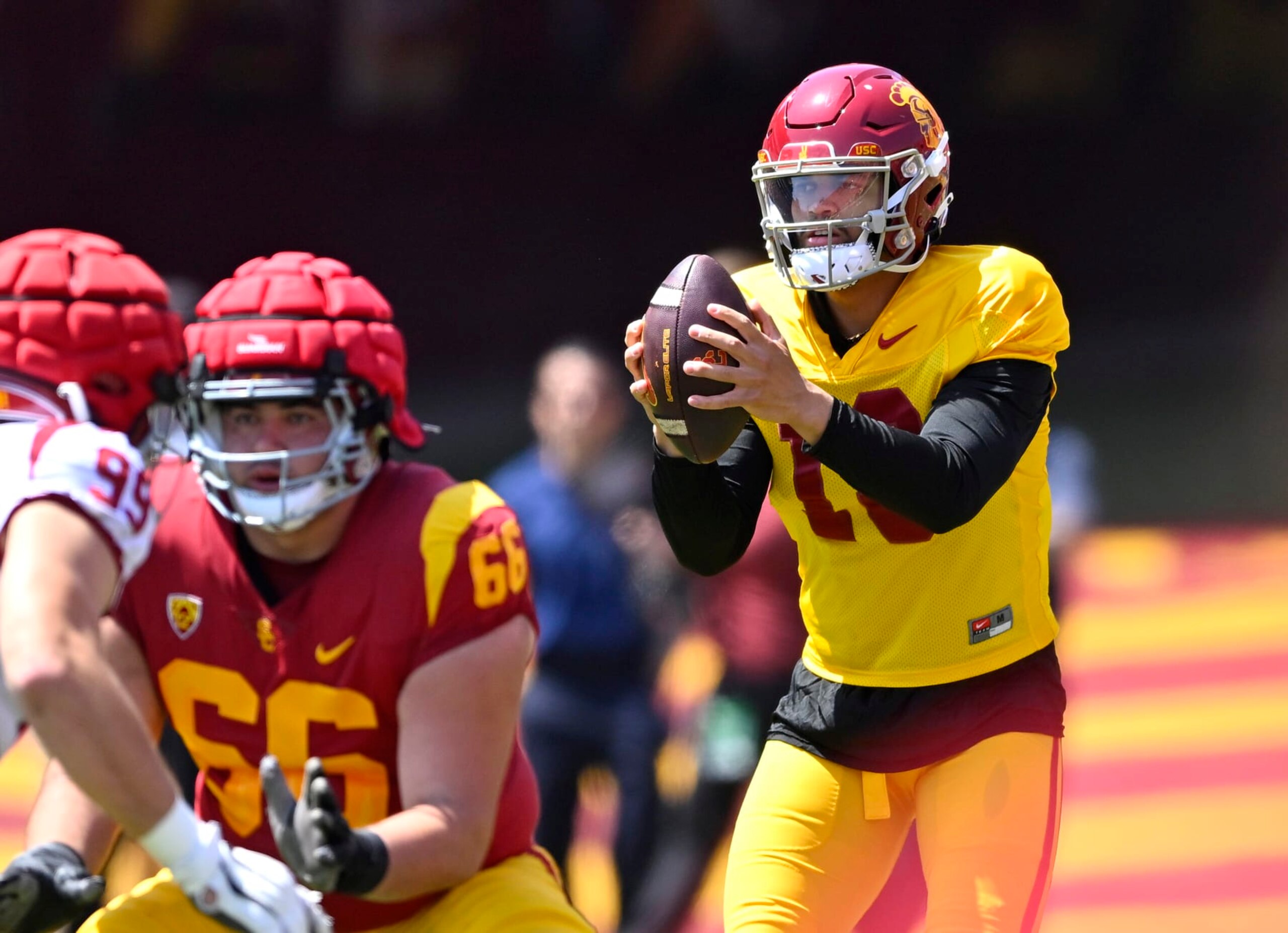 LOS ANGELES, CA - APRIL 15: Quarterback Caleb Williams #13 of the USC Trojans takes a snap during the USC spring game at the Los Angeles Memorial Coliseum on April 15, 2023 in Los Angeles, California. (Photo by Jayne Kamin-Oncea/Getty Images)