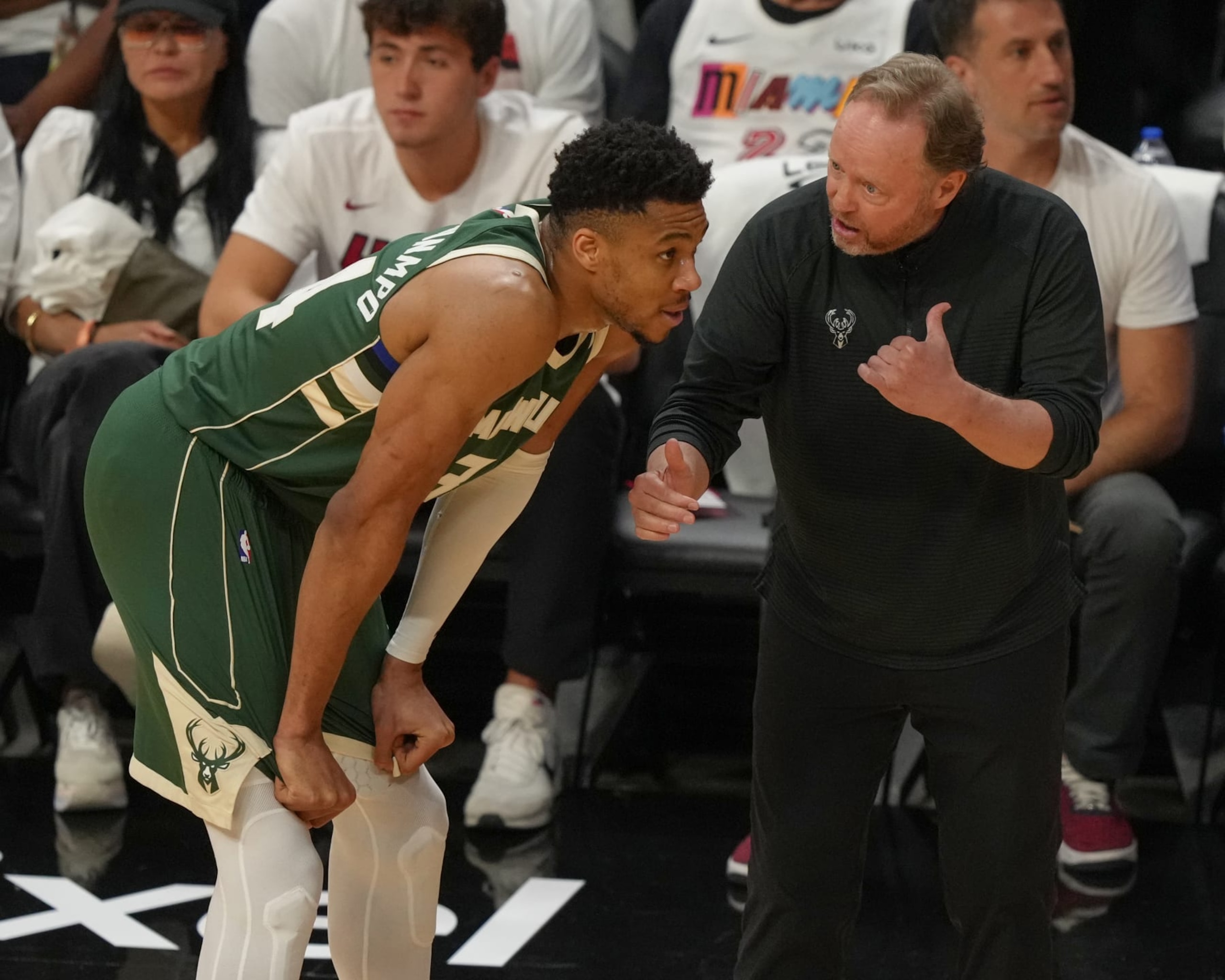MIAMI, FL - APRIL 24:  Giannis Antetokounmpo #34 of the Milwaukee Bucks & Head Coach Mike Budenholzer of the Milwaukee Bucks looks on during the game during round one game four of the 2023 NBA Playoffs on April 24, 2023 at Miami-Dade Arena in Miami, Florida. NOTE TO USER: User expressly acknowledges and agrees that, by downloading and or using this Photograph, user is consenting to the terms and conditions of the Getty Images License Agreement. Mandatory Copyright Notice: Copyright 2023 NBAE (Photo by Eric Espada/NBAE via Getty Images)