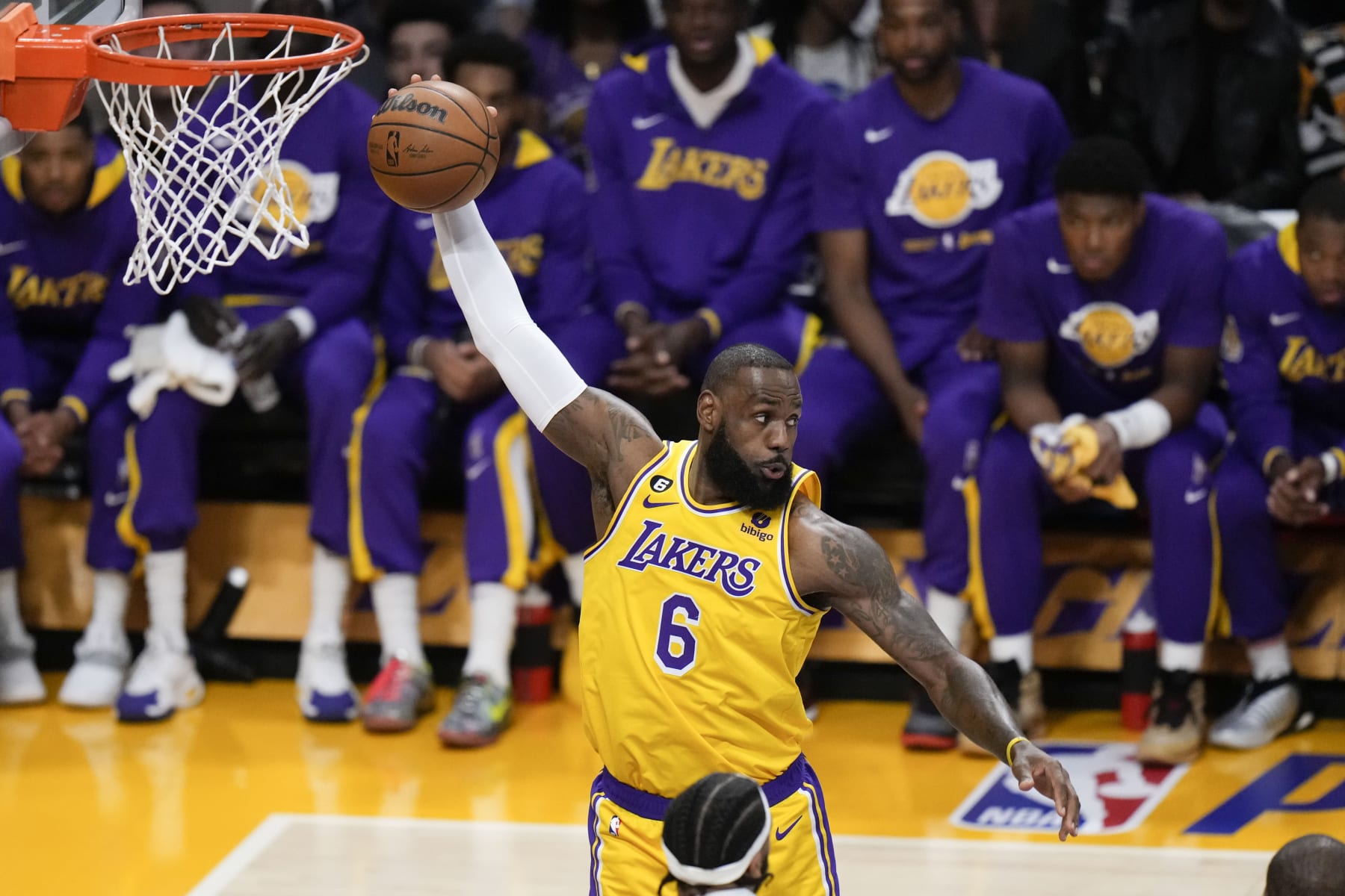 Los Angeles Lakers' LeBron James grabs a rebound during the first half in Game 6 of the team's first-round NBA basketball playoff series against the Memphis Grizzlies on Friday, April 28, 2023, in Los Angeles. (AP Photo/Jae C. Hong)